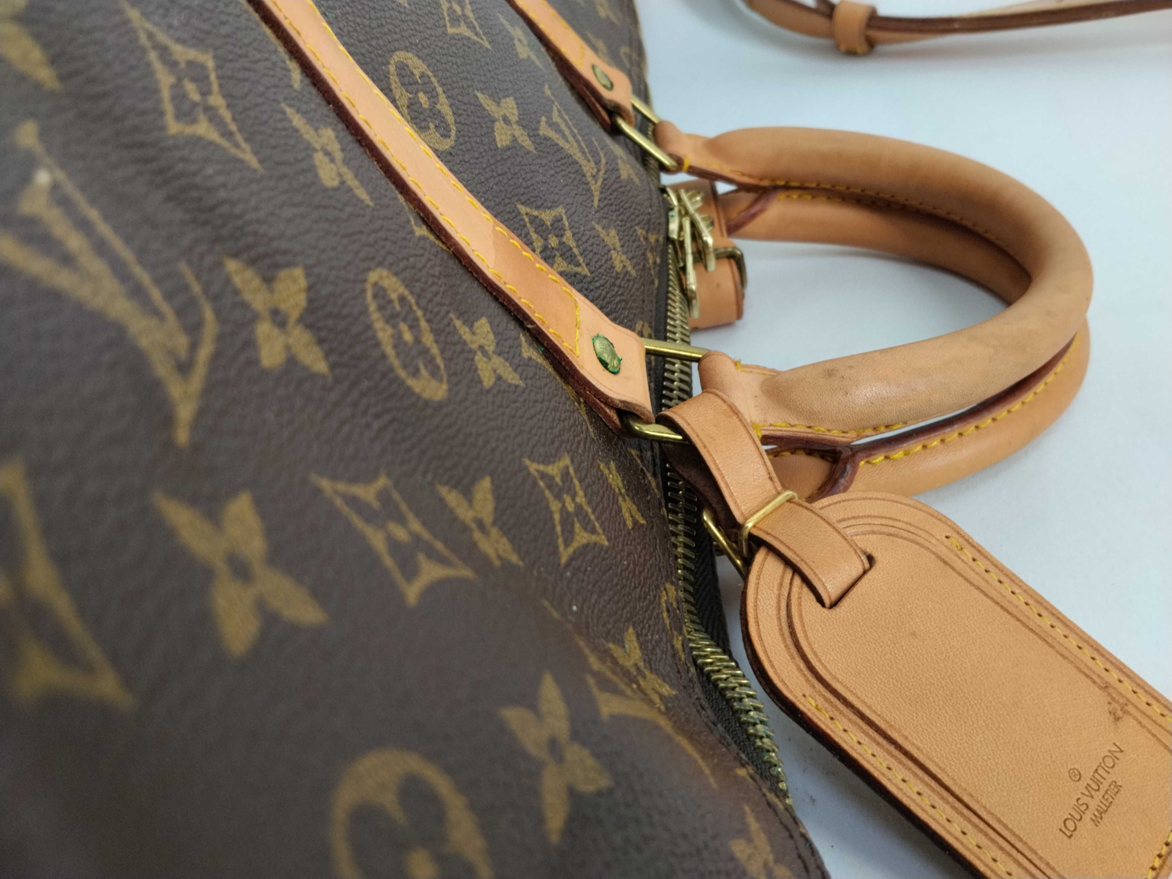 Monogram Keepall 55 Boston bag, bandolier, discoloration, scuffs. — view 6