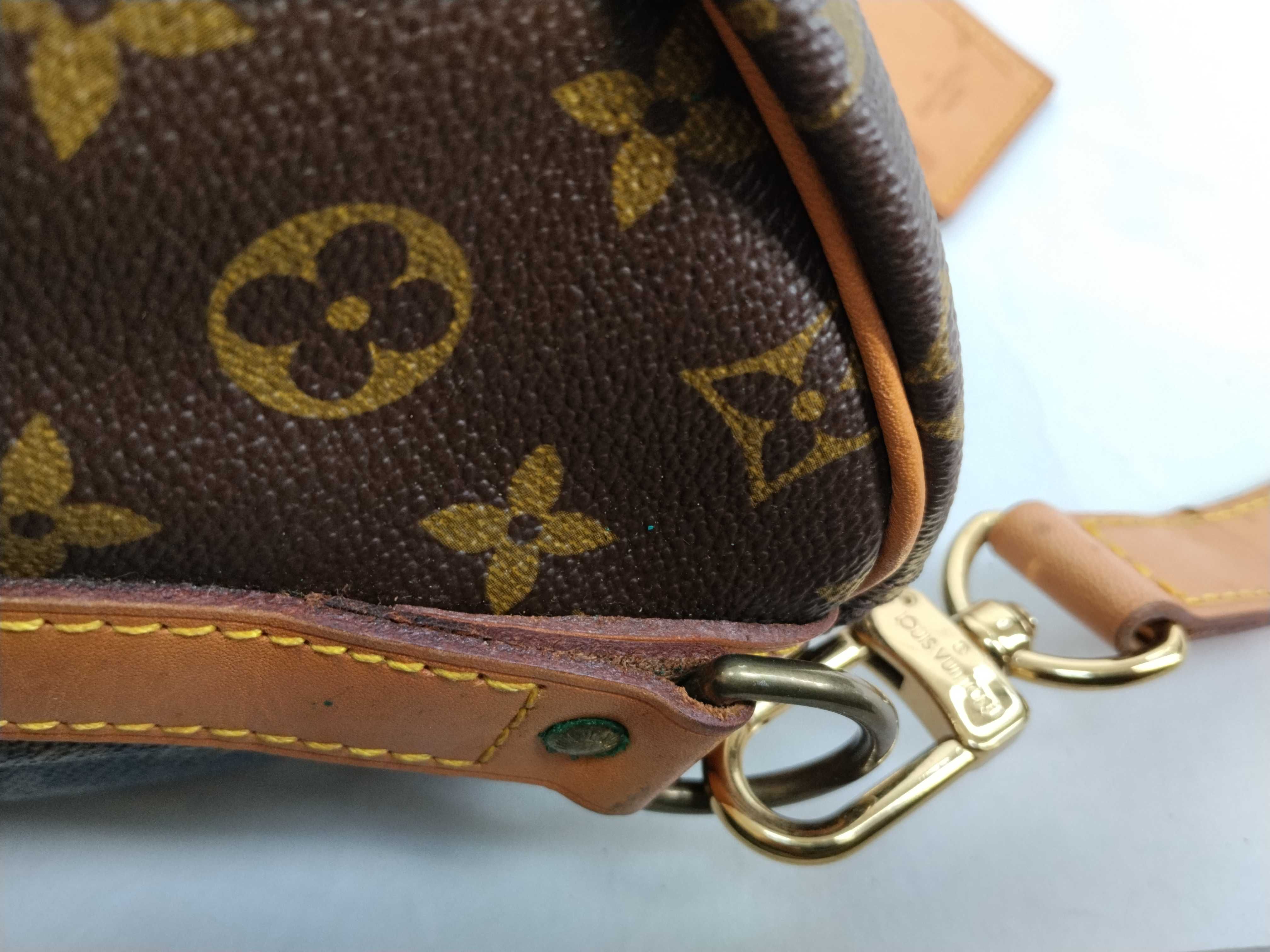 Monogram Keepall 55 Boston bag, bandolier, discoloration, scuffs. — view 7
