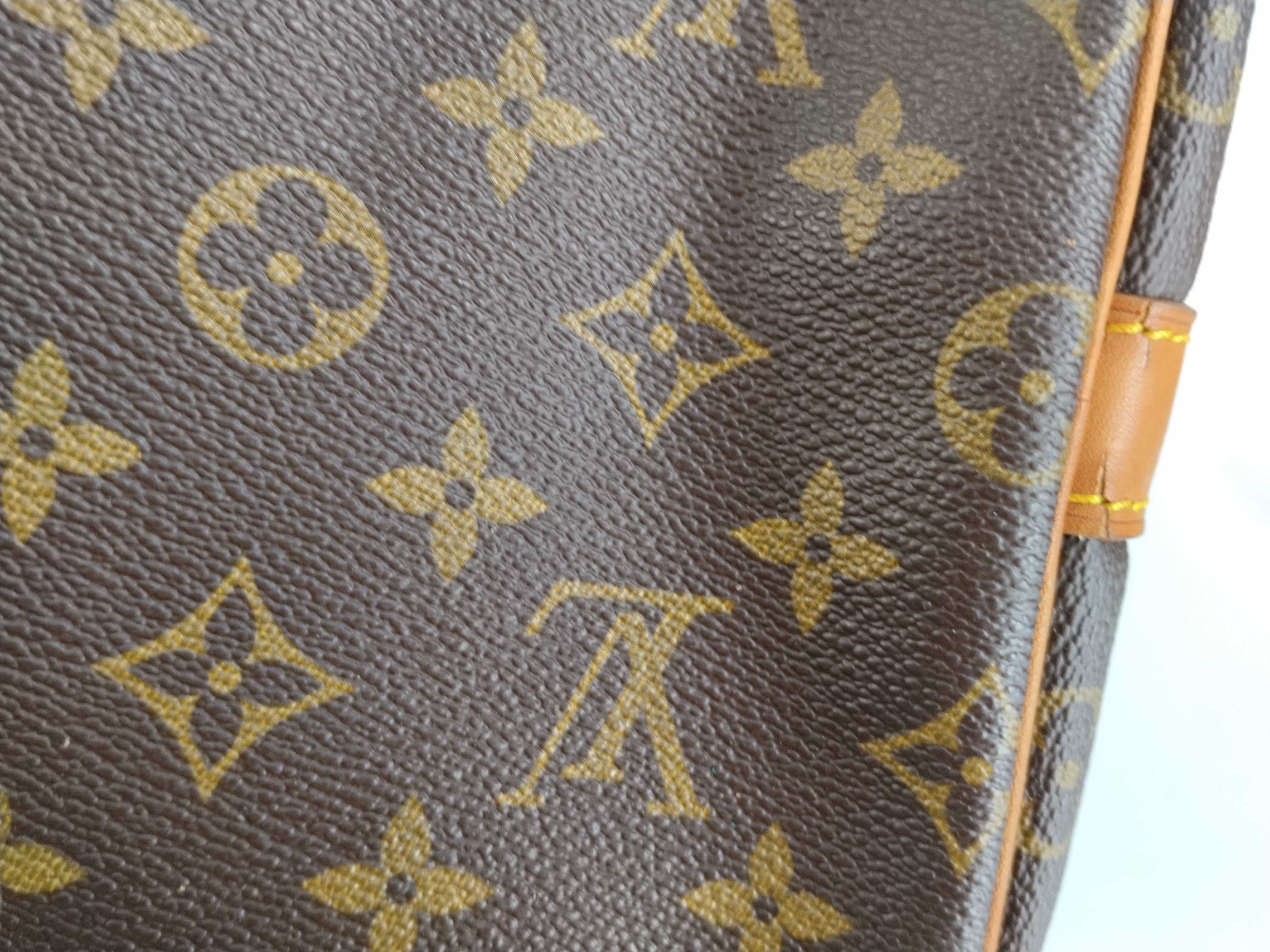 Monogram Keepall 55 Boston bag, bandolier, discoloration, scuffs. — view 10