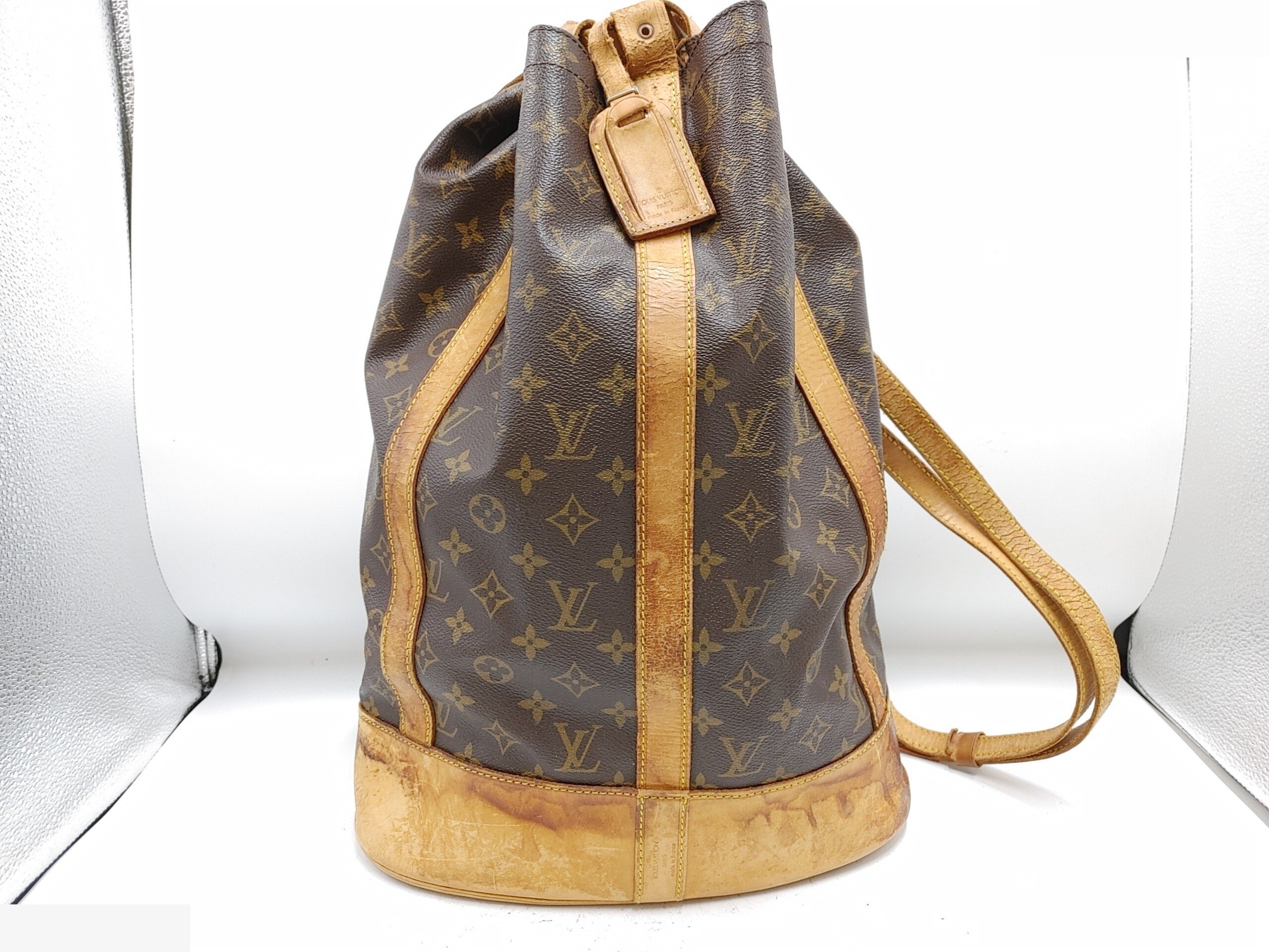 Monogram Randonee GM M42244, serial number unclear, with pouch, PVC, brown.
