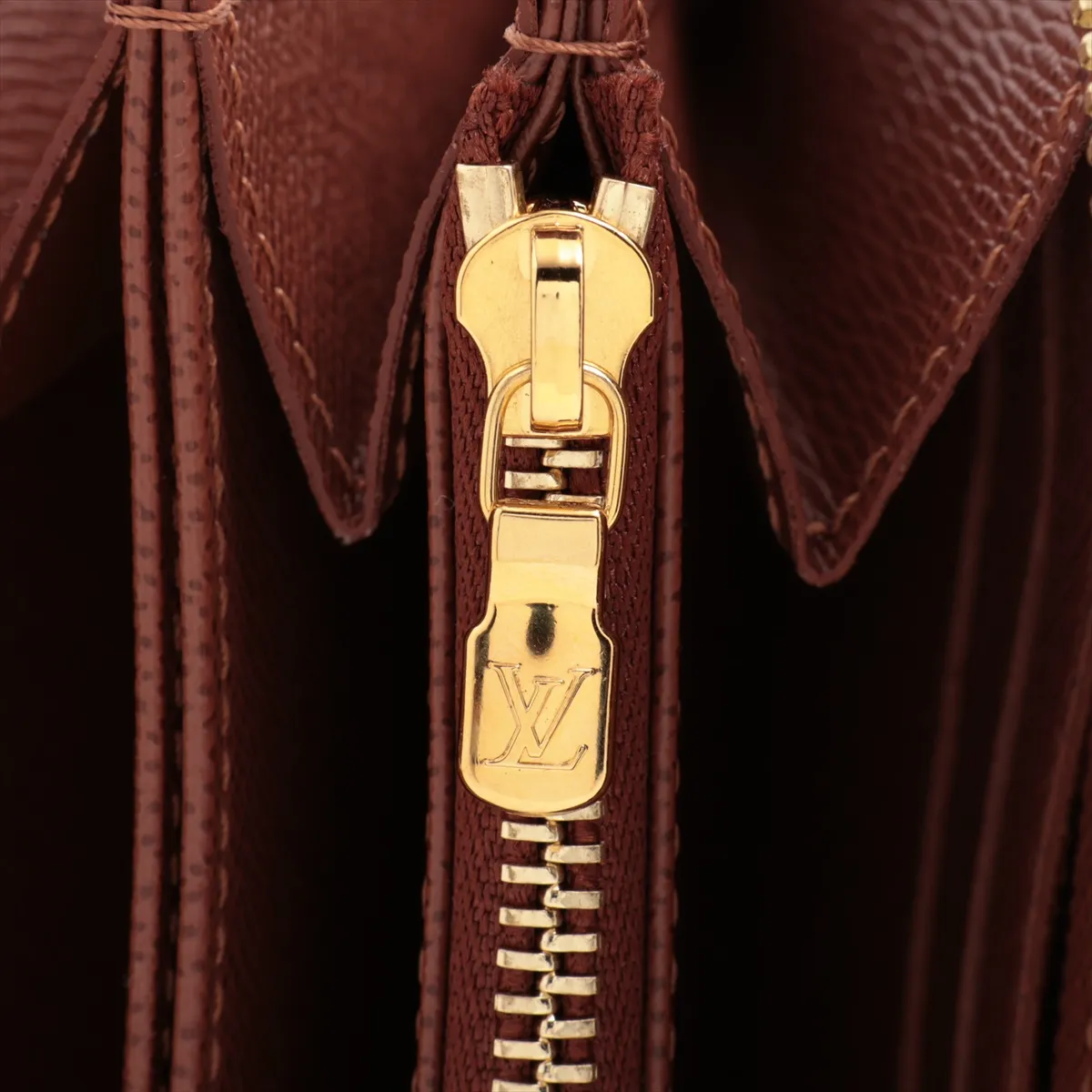 Monogram Zippy Wallet, model number unknown, brown, round zip wallet, My LV World Tour, RFID detected. — view 12
