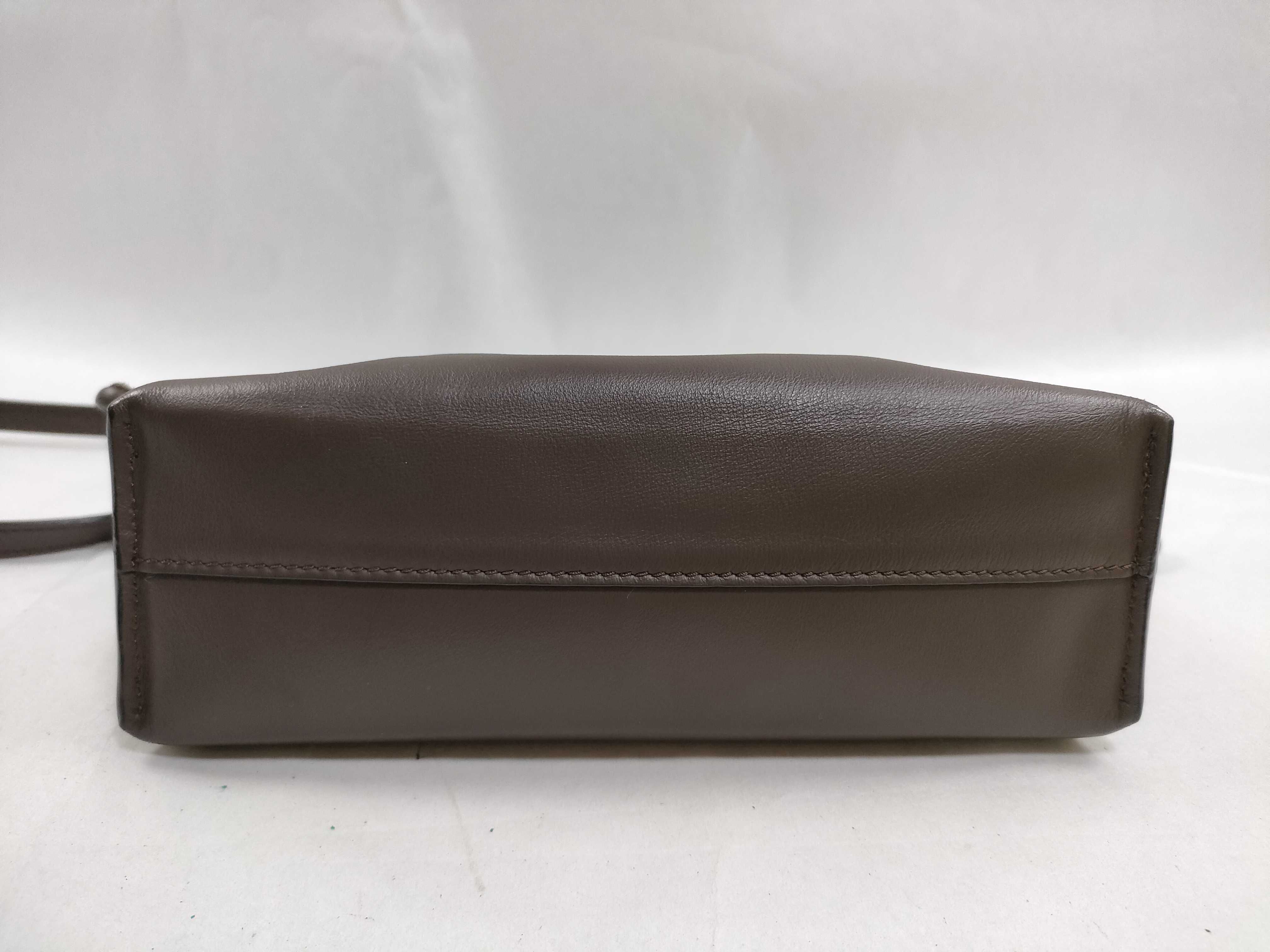 Flamenco Clutch Mini Brown Leather. Accessories: Dust bag, shoulder strap, shoulder bag. — view 7