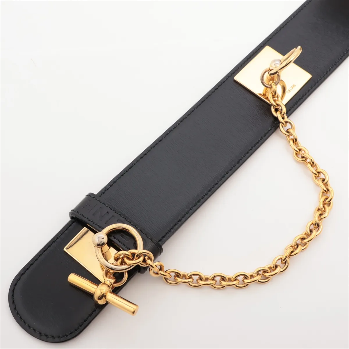 logo belt, size 65, GP leather, black and gold. Shows signs of wear, including — view 2