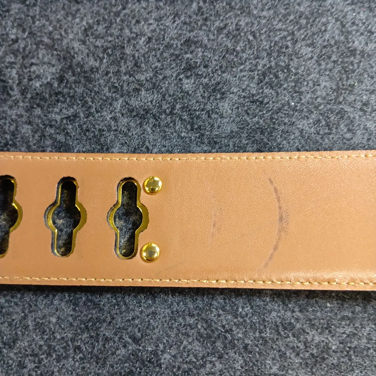 logo belt, size 65, GP leather, black and gold. Shows signs of wear, including — view 6