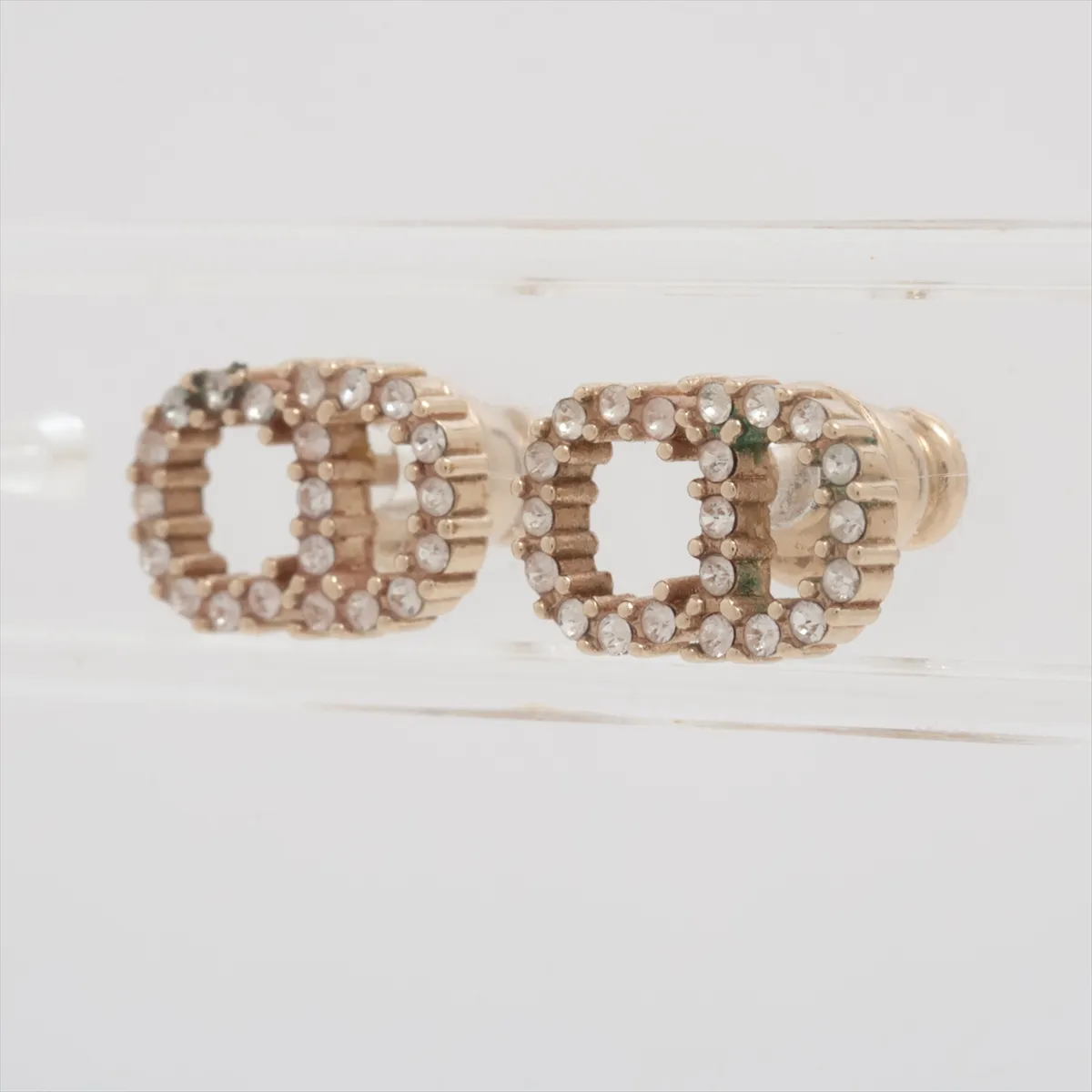 CD logo earrings (for both ears), gold-plated with rhinestones. Shows wear, tarnishing, — view 3