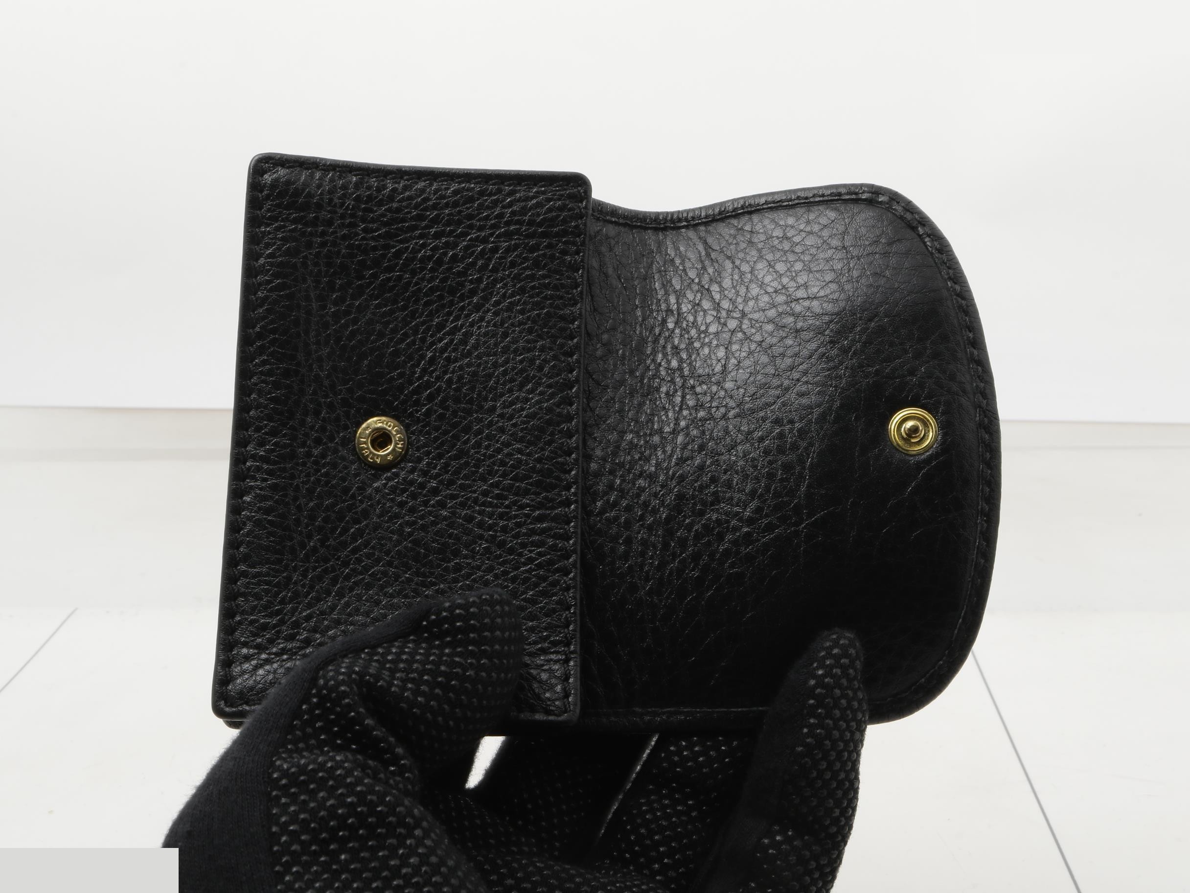 Leather card case with gold hardware. — view 4
