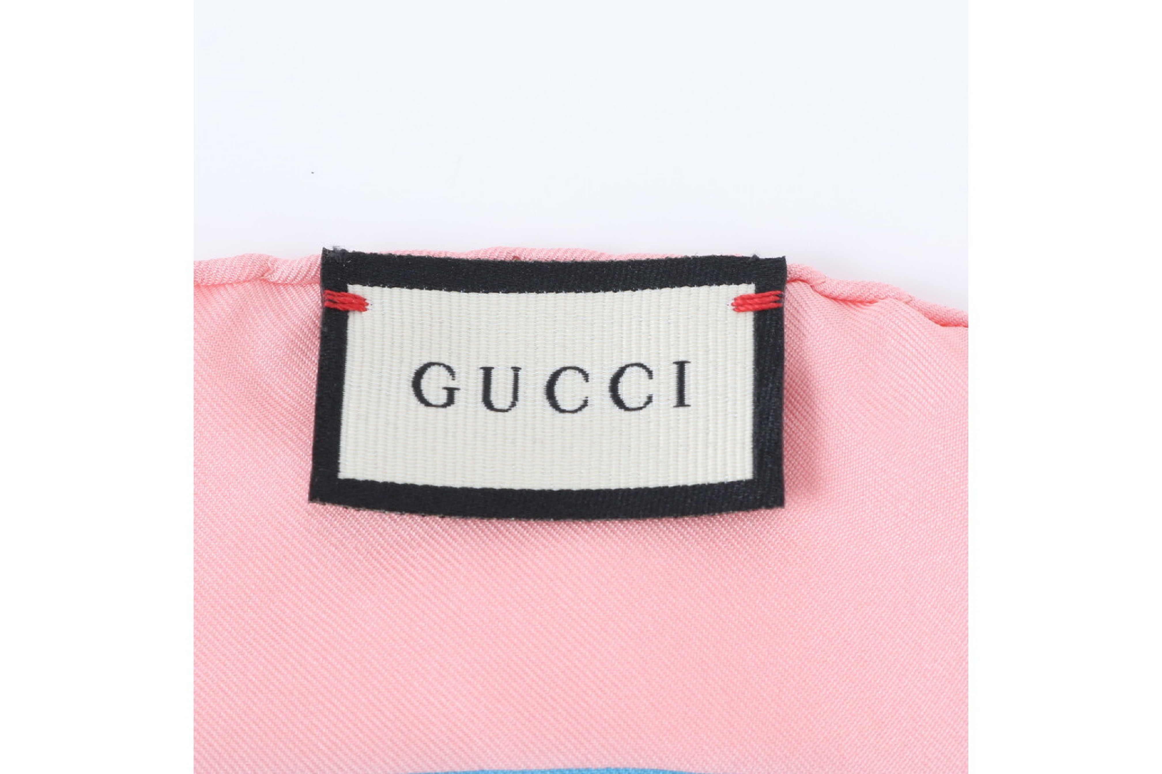 tag attached GG Bee scarf and other accessories — view 7