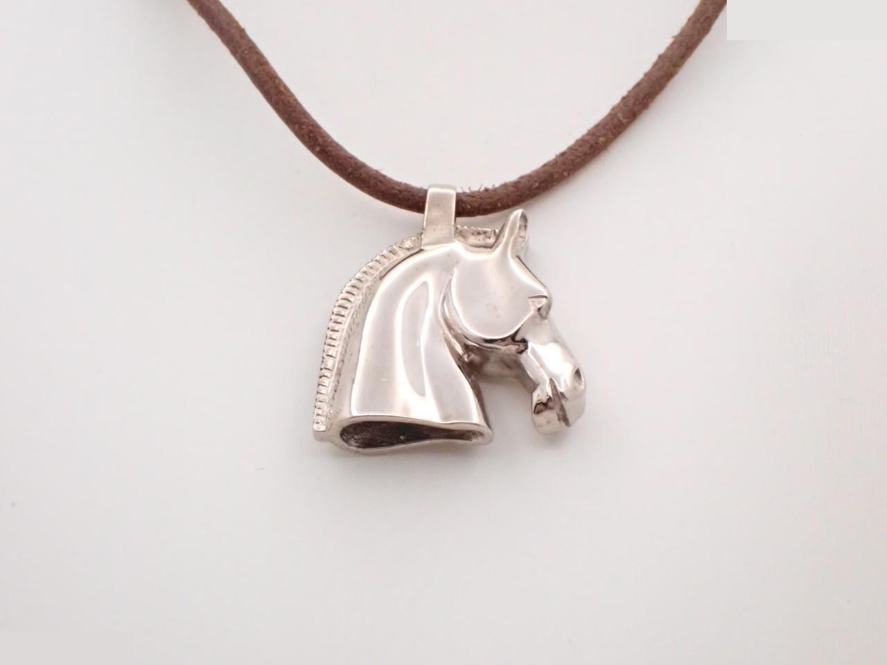 Necklace, Cheval Horse design, silver, cord approximately 58cm