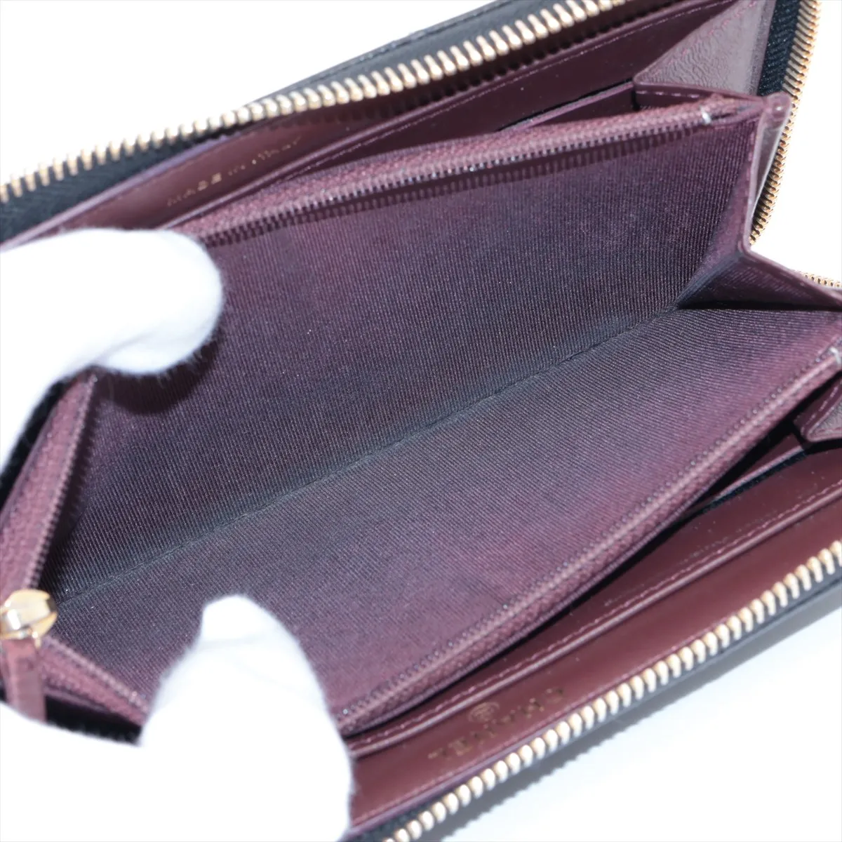 Matelasse caviar skin round zip wallet black gold hardware 25431626 — view 8