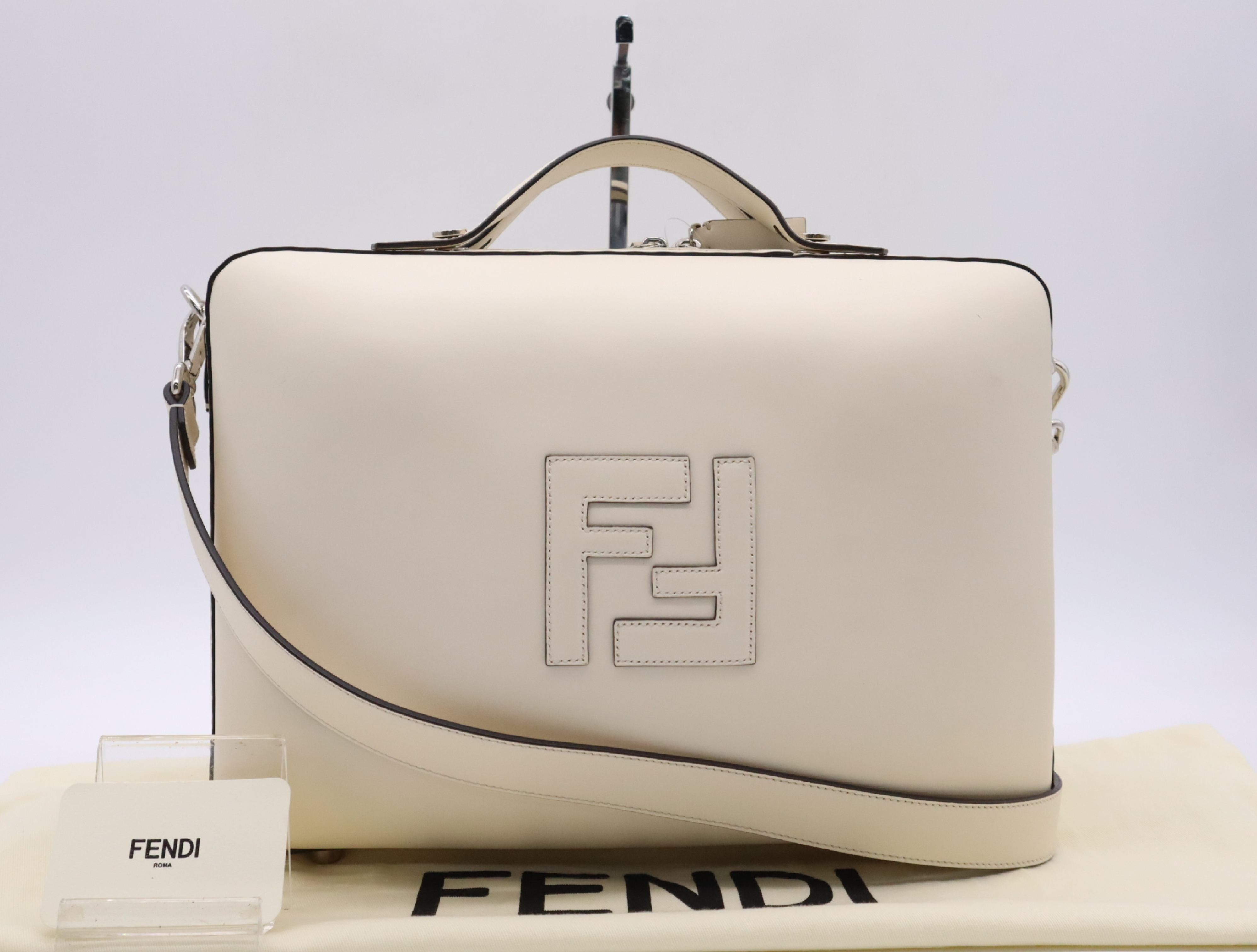 Leather Suitcase, Ivory, Silver Hardware, with Shoulder Strap and Dust Bag.