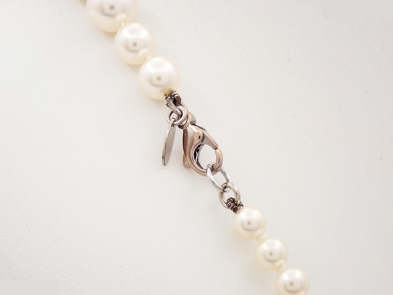 Long pearl necklace with Coco Mark design, chain approximately 86cm long. — view 2