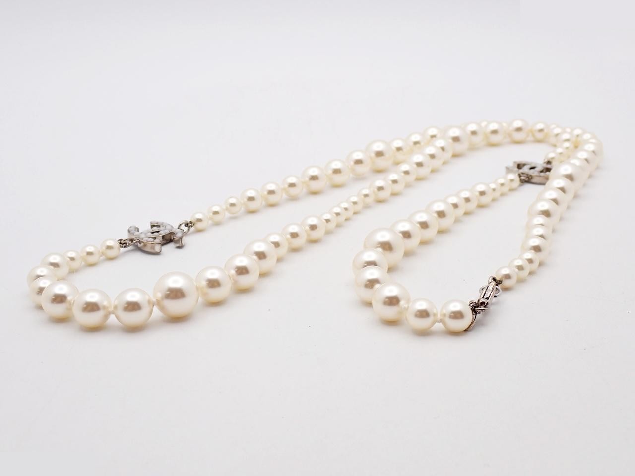 Long pearl necklace with Coco Mark design, chain approximately 86cm long. — view 3