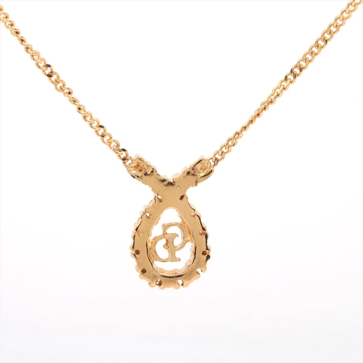 CD logo necklace, gold plated with rhinestones, shows signs of wear, tarnishing, — view 2