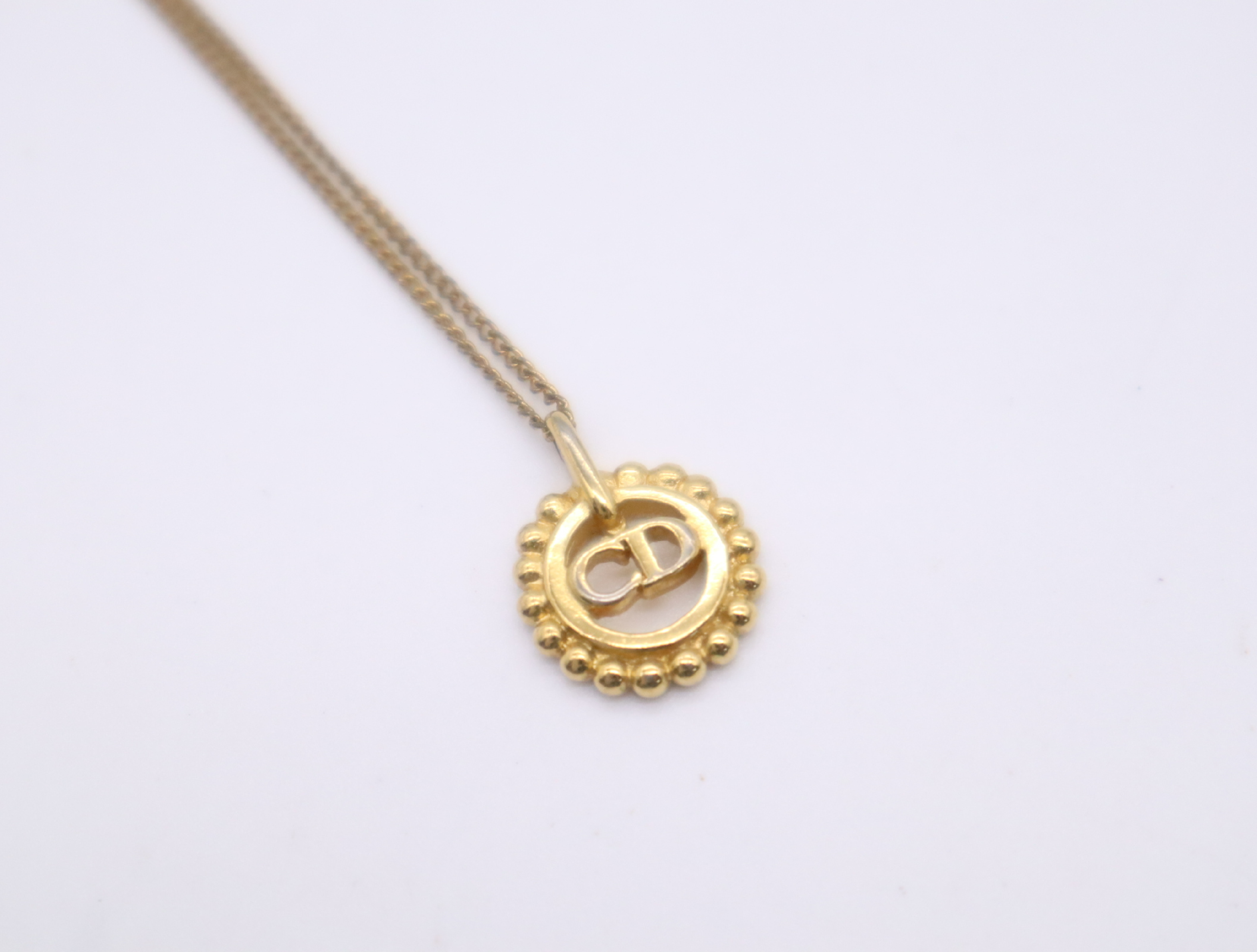 GPCD logo circle motif necklace — view 3