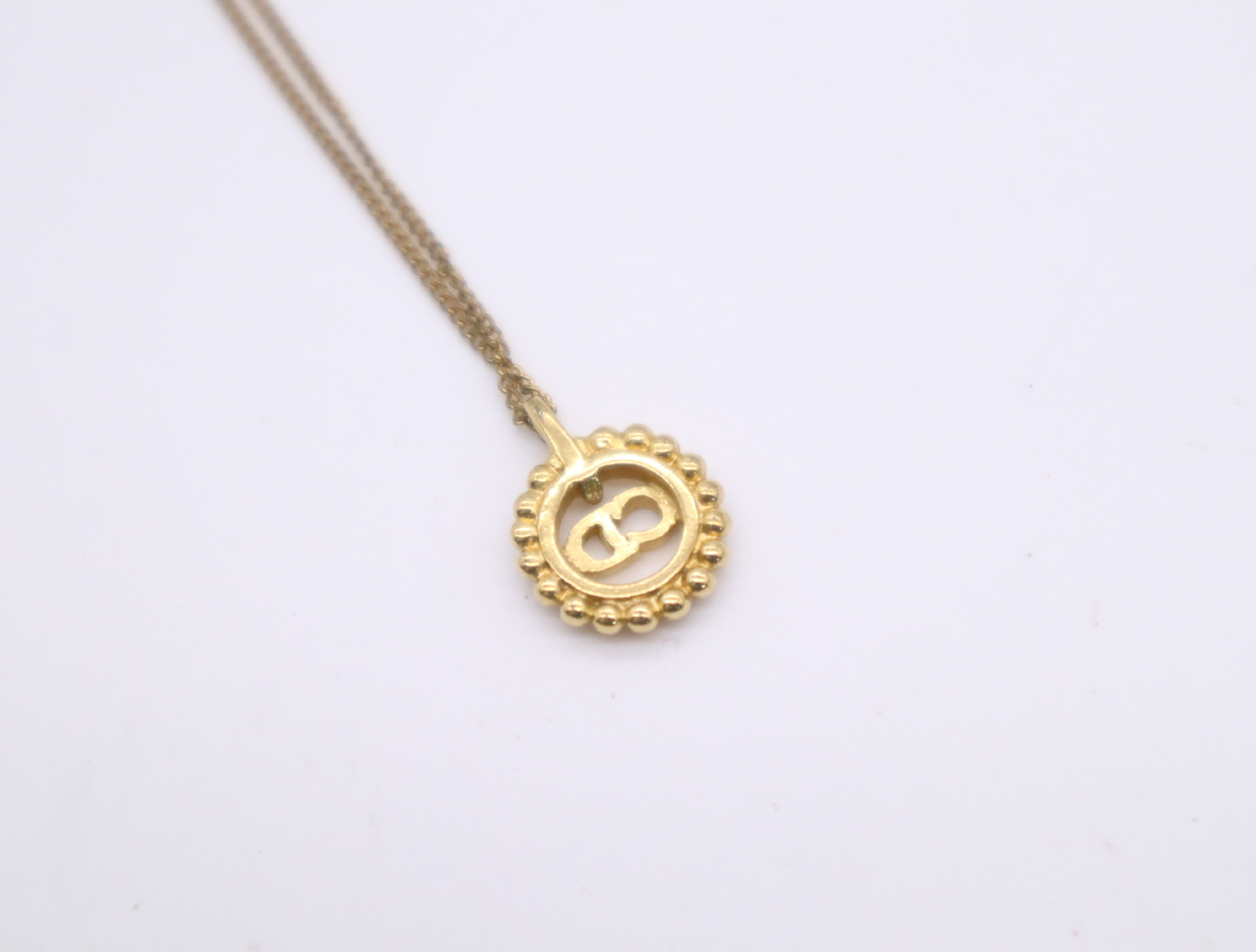 GPCD logo circle motif necklace — view 4