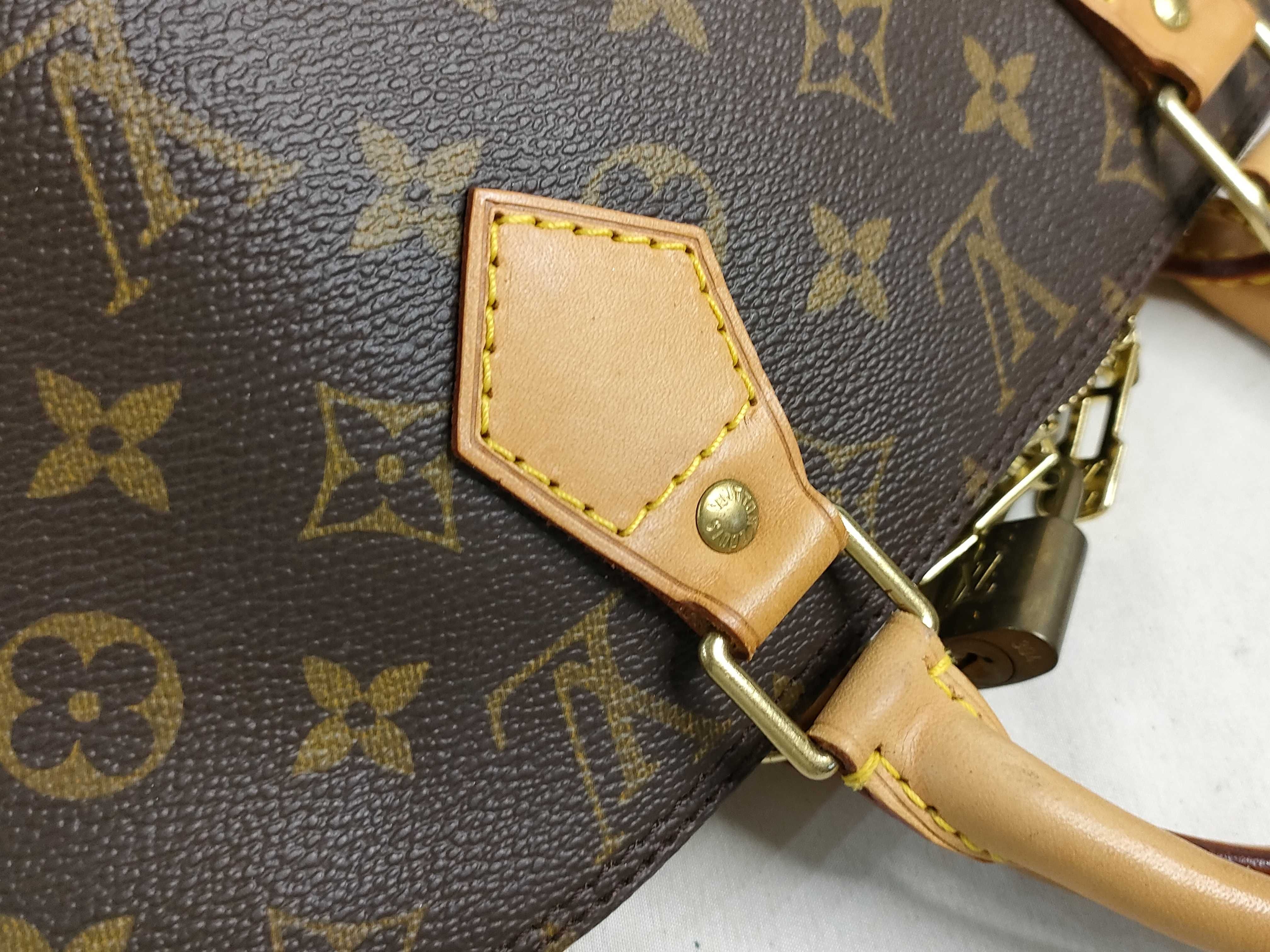 Alma Monogram Handbag M51130 with Padlock — view 5