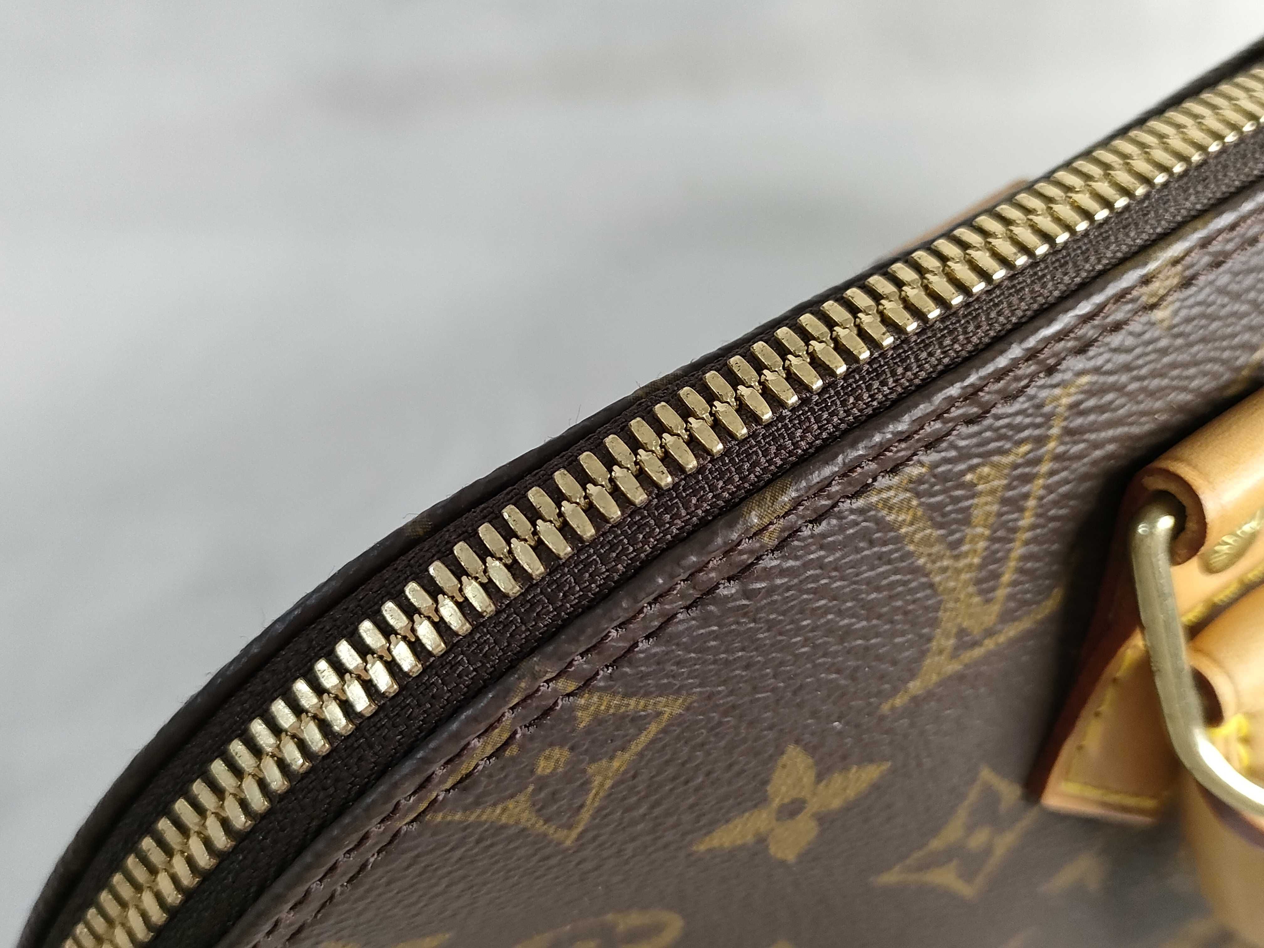 Alma Monogram Handbag M51130 with Padlock — view 8
