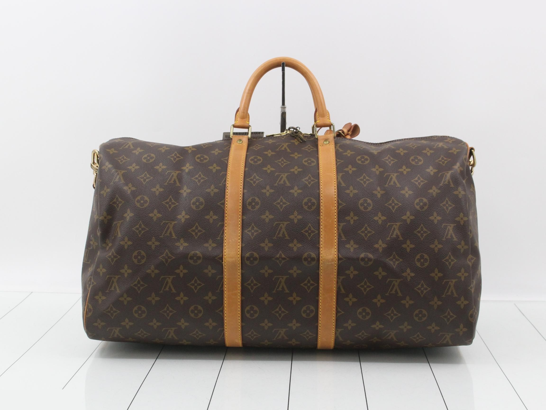 Keepall Bandouliere 55: Shoulder strap, padlock, 2 keys, name tag. — view 2