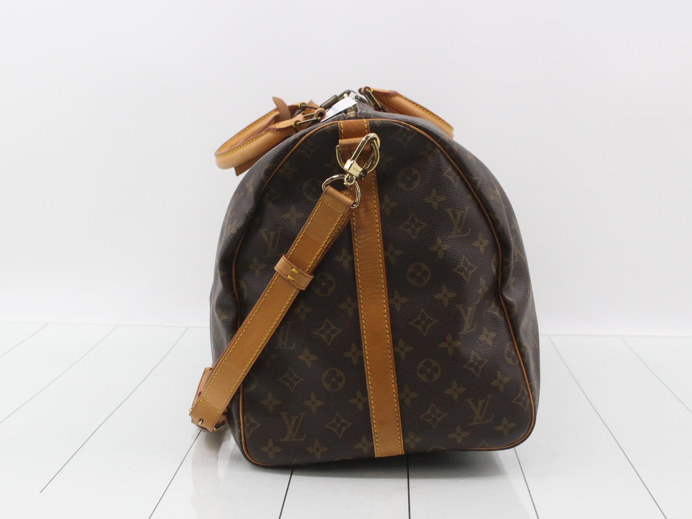Keepall Bandouliere 55: Shoulder strap, padlock, 2 keys, name tag. — view 3