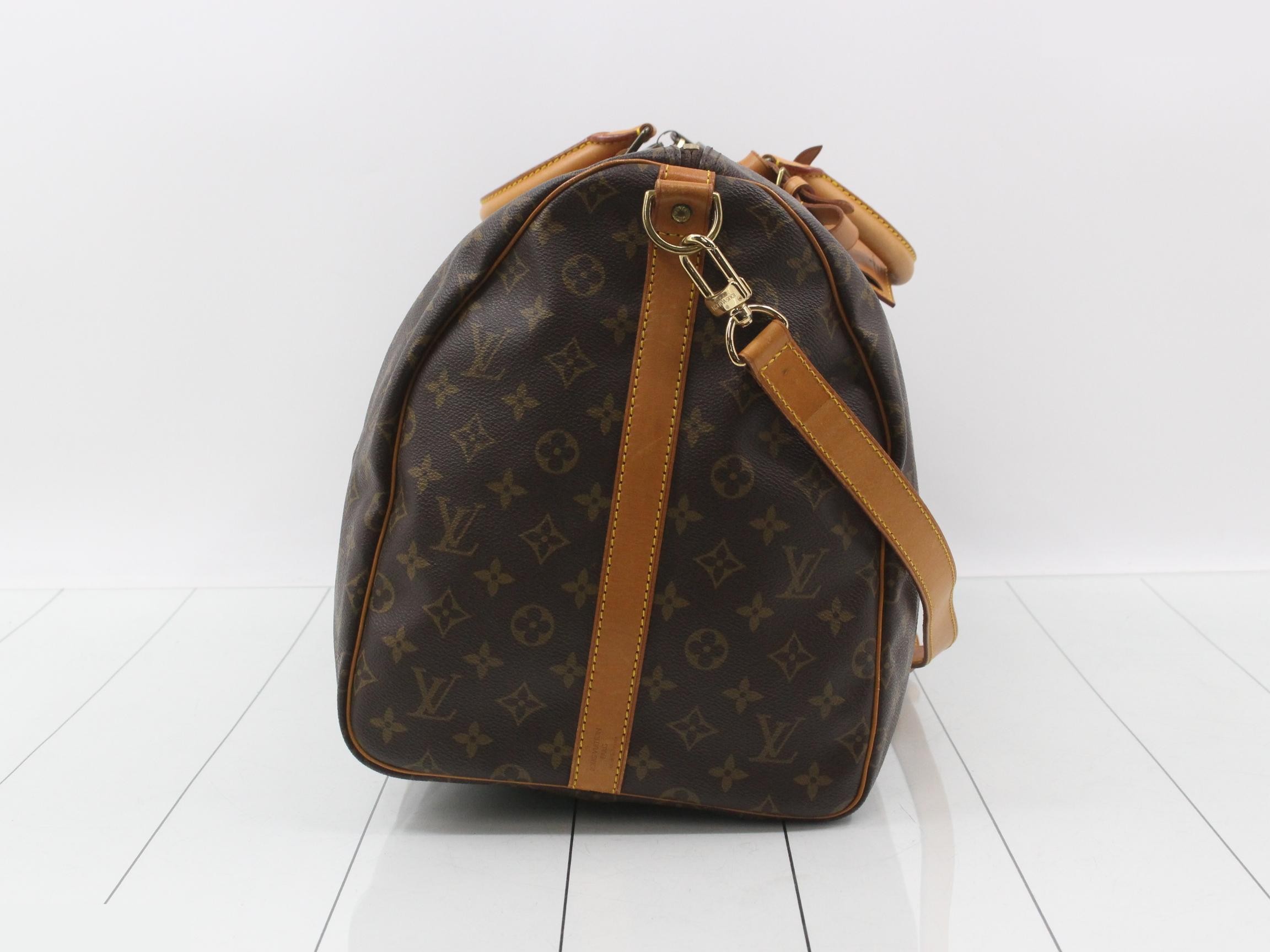 Keepall Bandouliere 55: Shoulder strap, padlock, 2 keys, name tag. — view 4