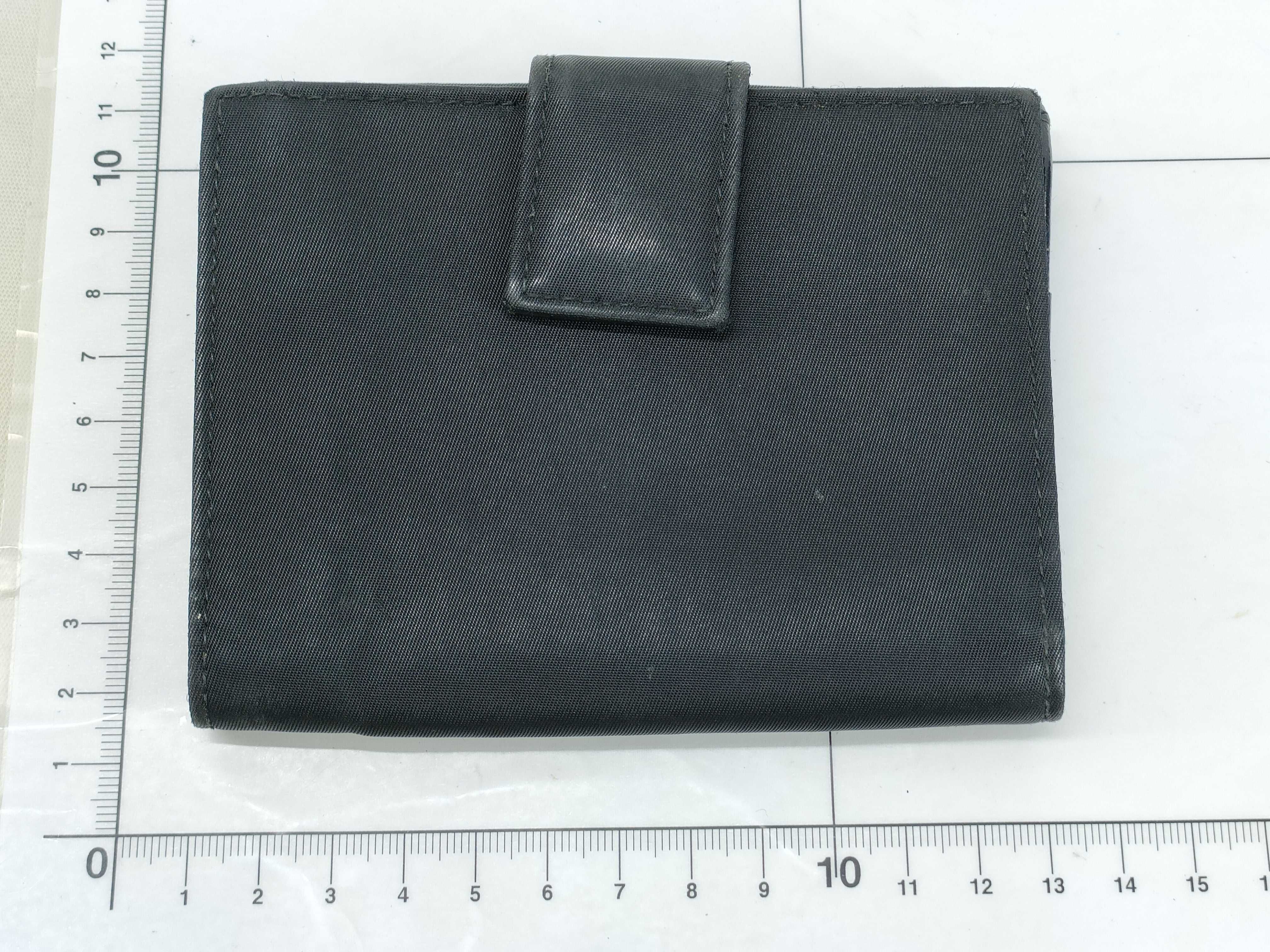 nylon bifold wallet with triangular logo hardware. — view 2