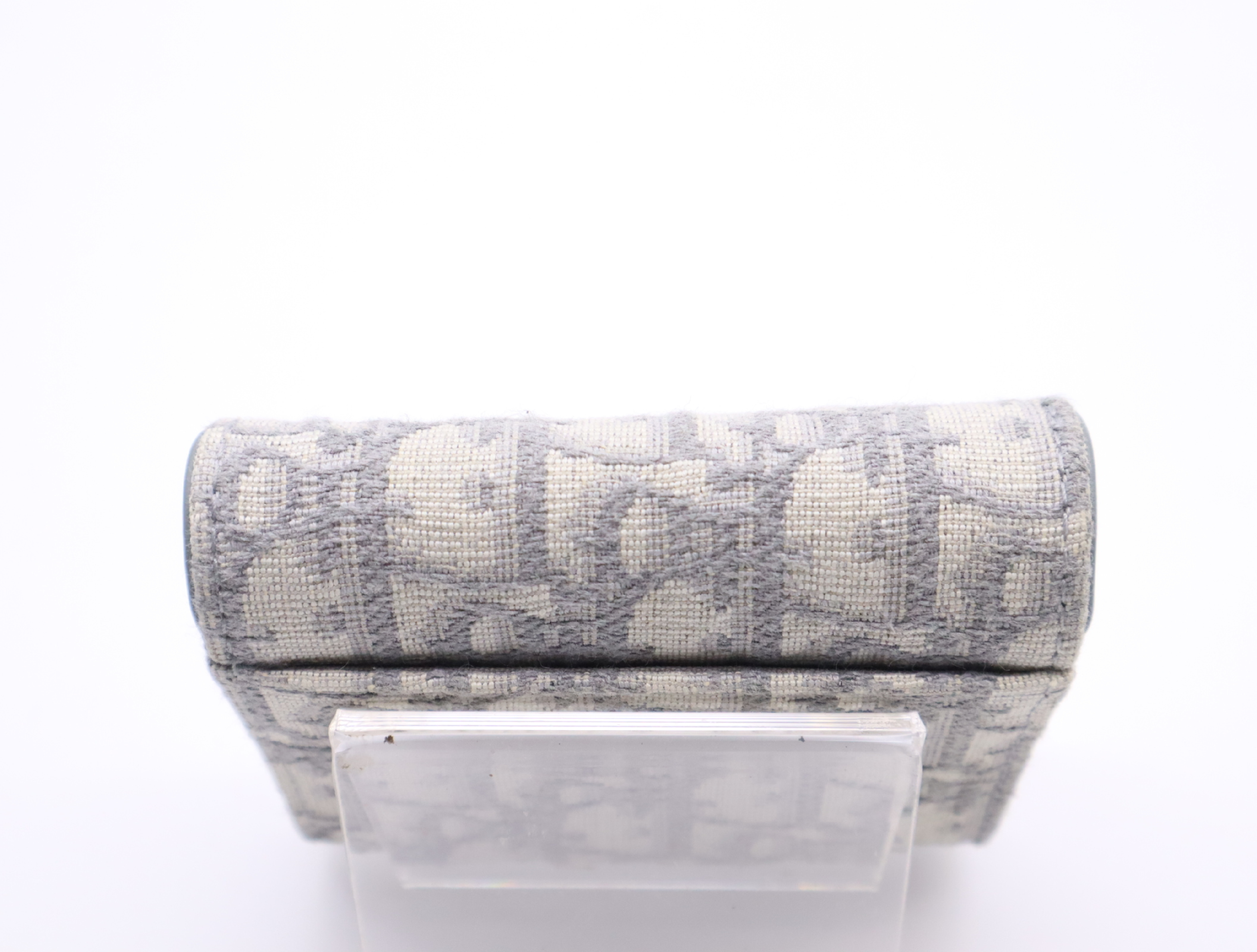 S5652 CTZQ Oblique Jacquard Saddle Lotus Wallet, Gray, with dust bag. — view 4