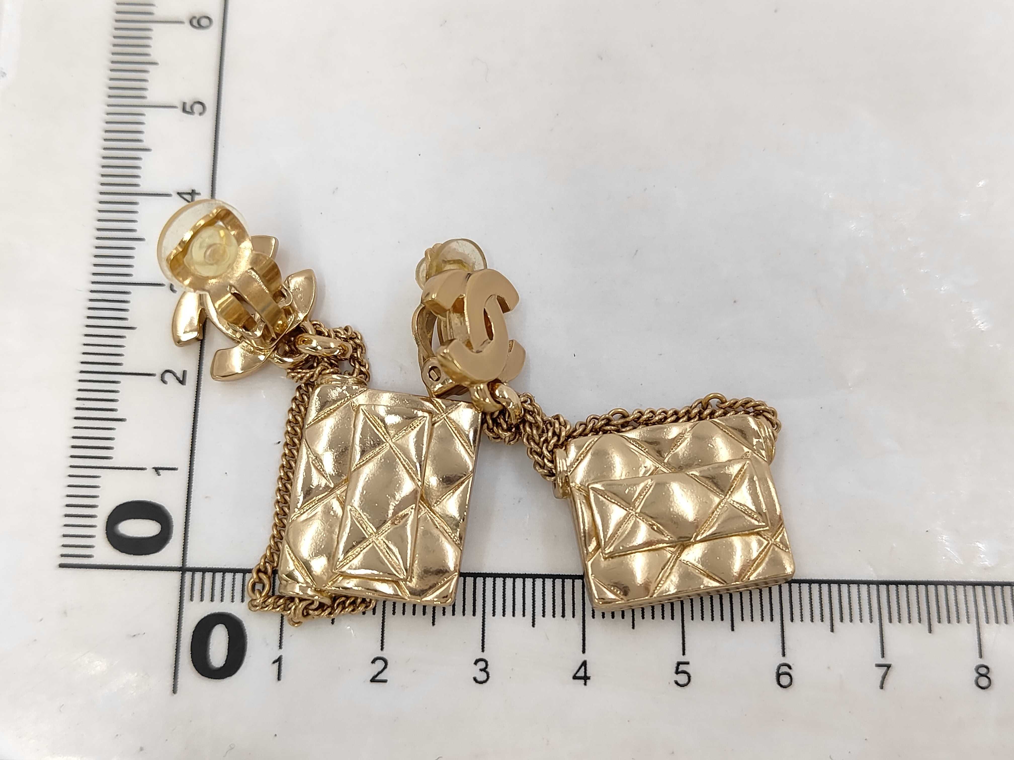 Matelassé motif earrings — view 7