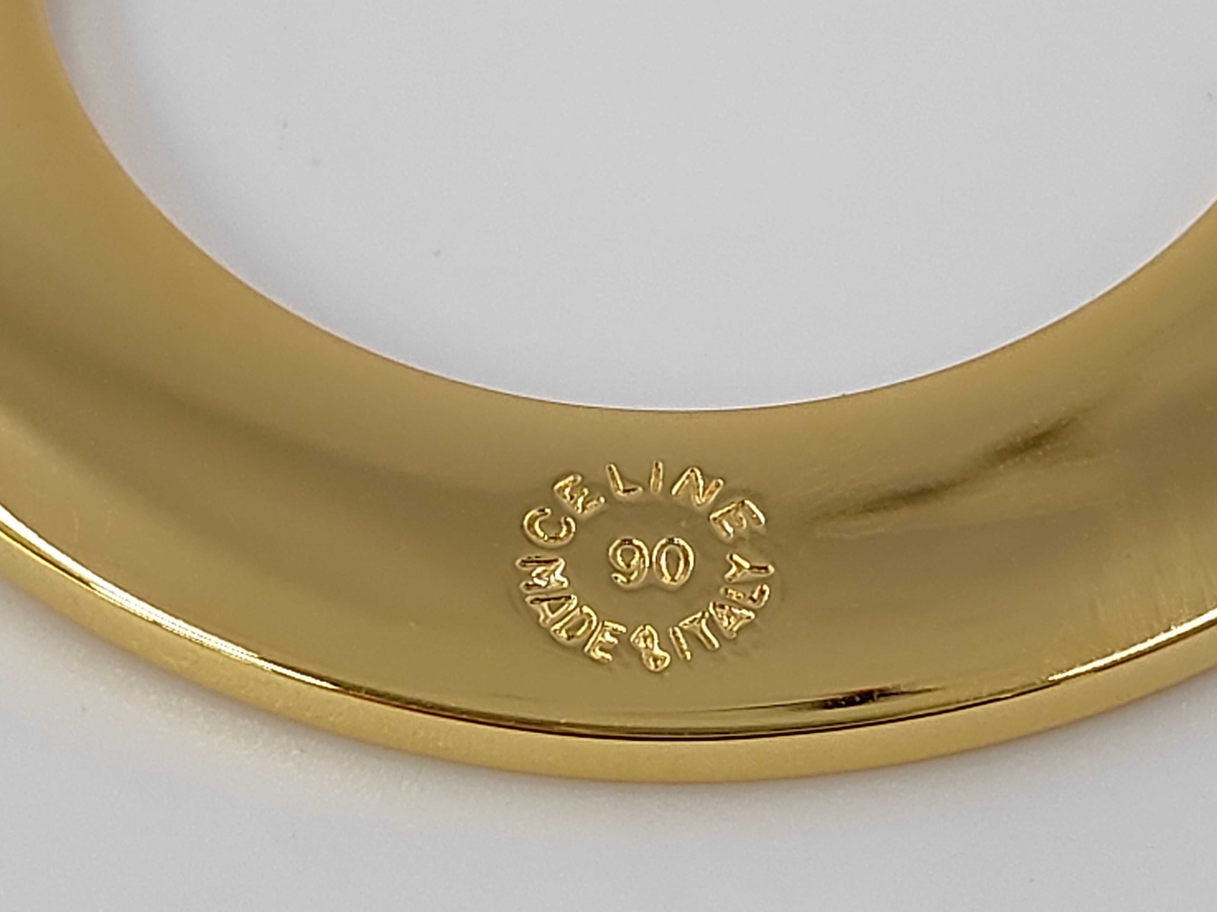 necklace pendant with circle logo in gold. — view 3