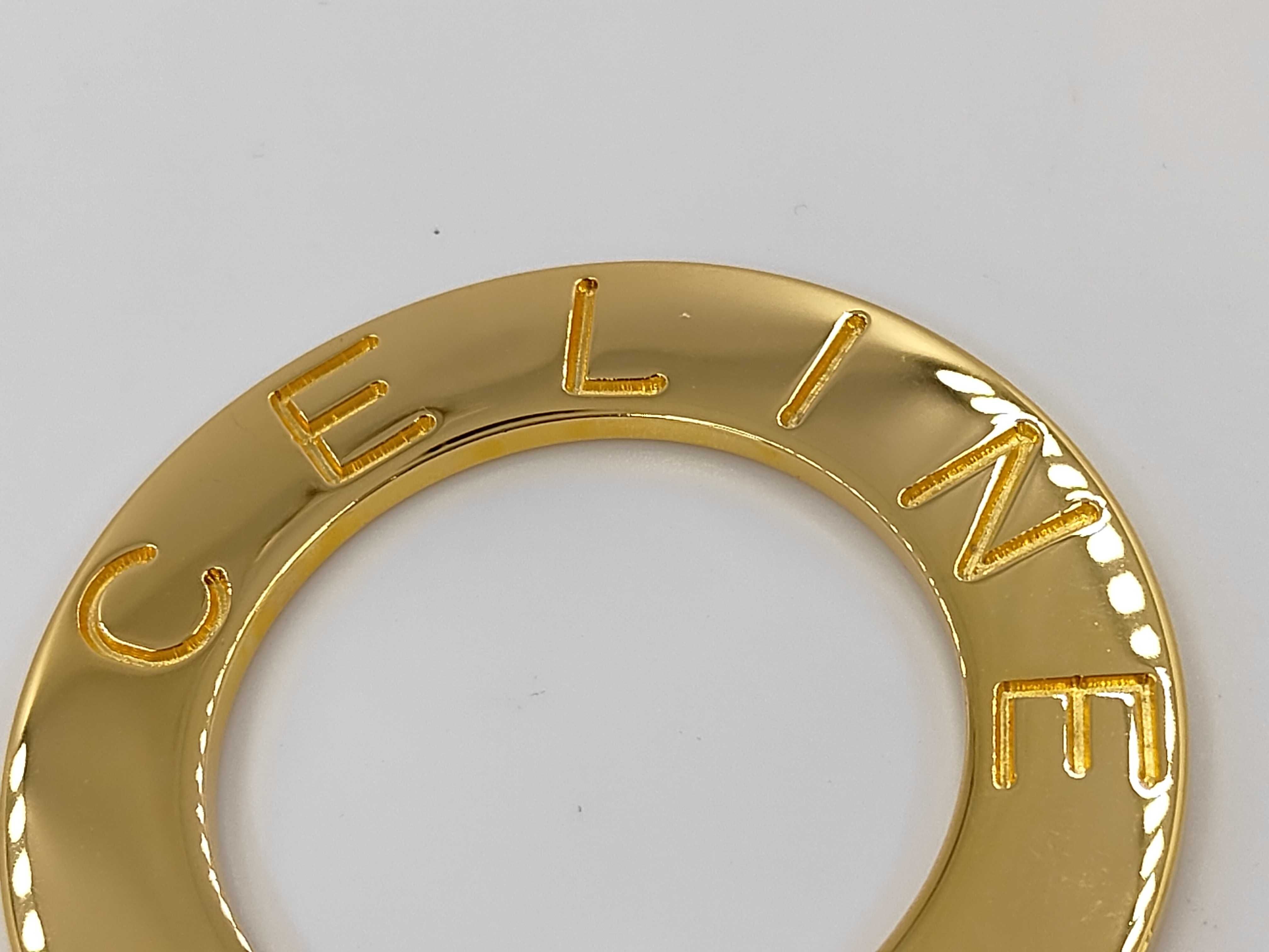 necklace pendant with circle logo in gold. — view 4