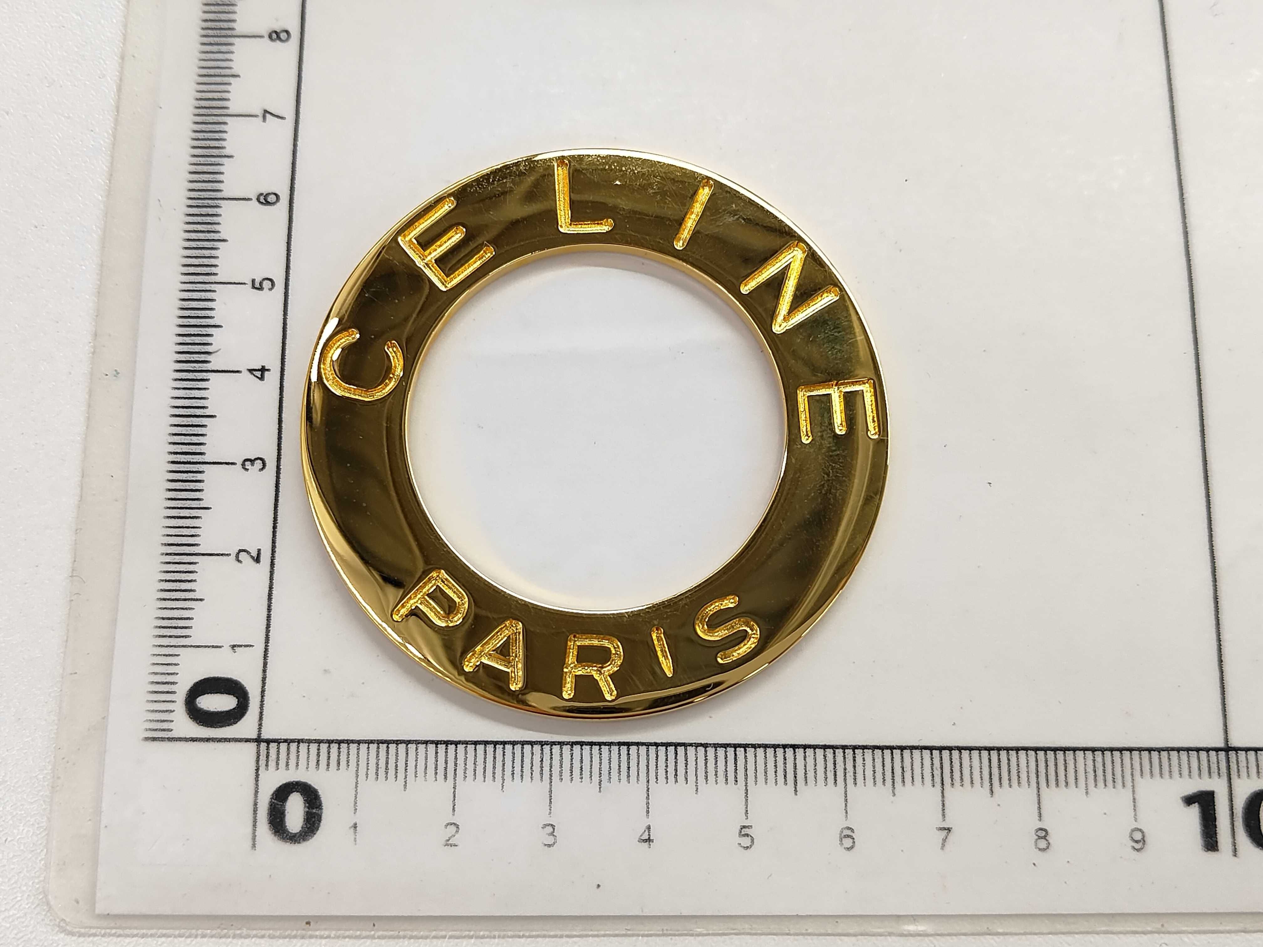 necklace pendant with circle logo in gold. — view 5