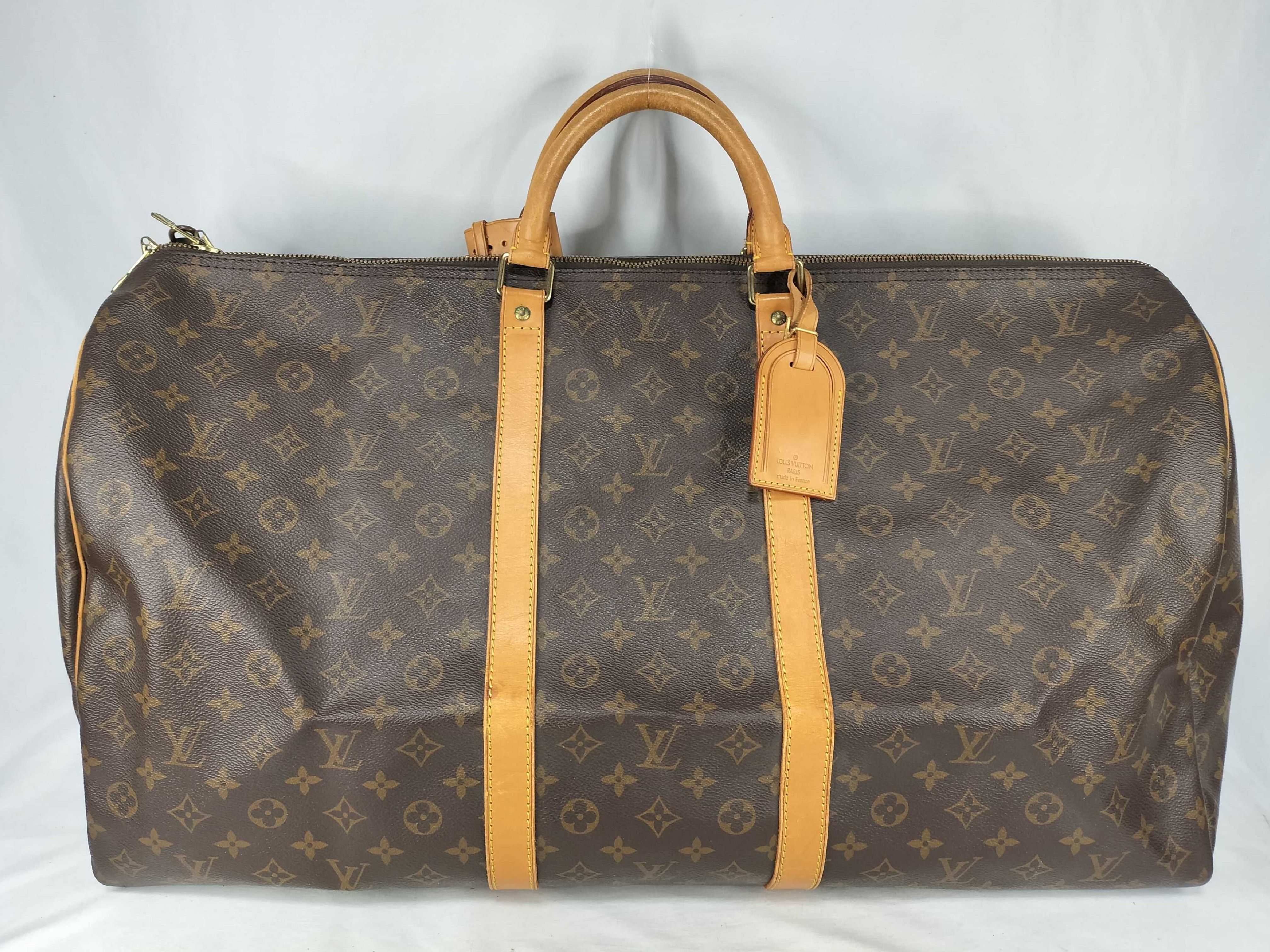 Monogram Keepall 60 SP0994 Boston bag (tag section has been glued back on)