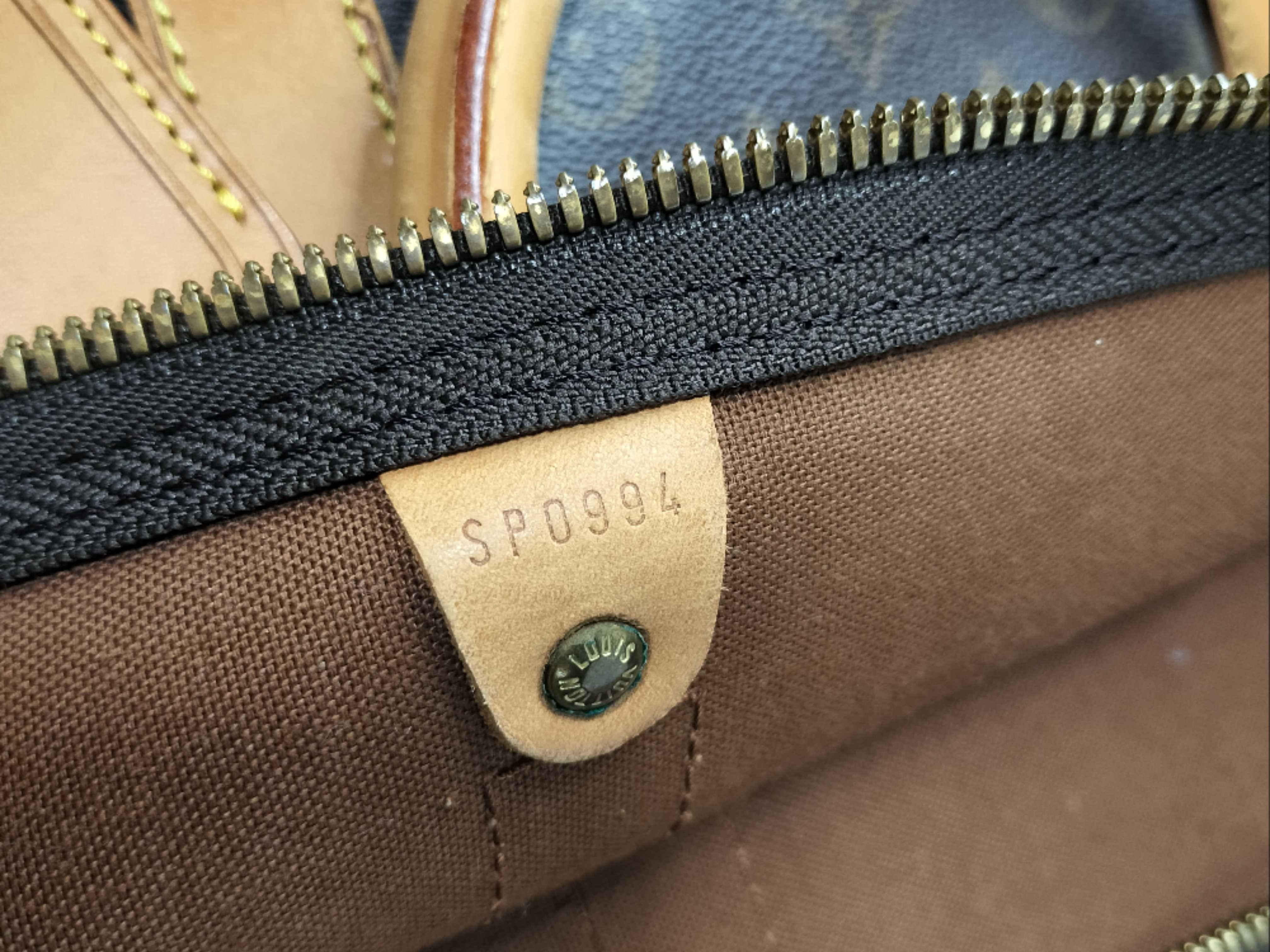 Monogram Keepall 60 SP0994 Boston bag (tag section has been glued back on) — view 12