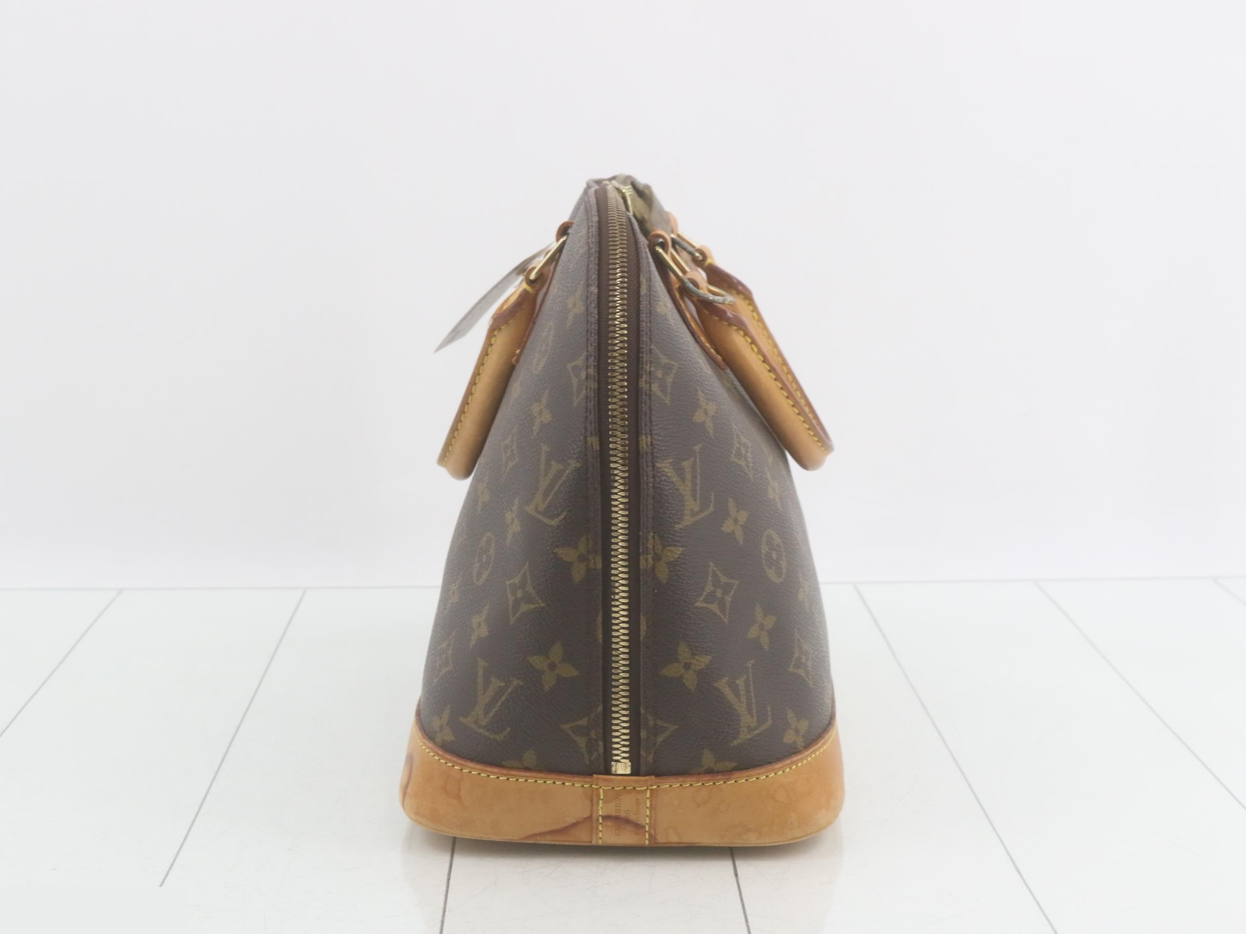 Alma MM handbag by Louis Vuitton — view 4