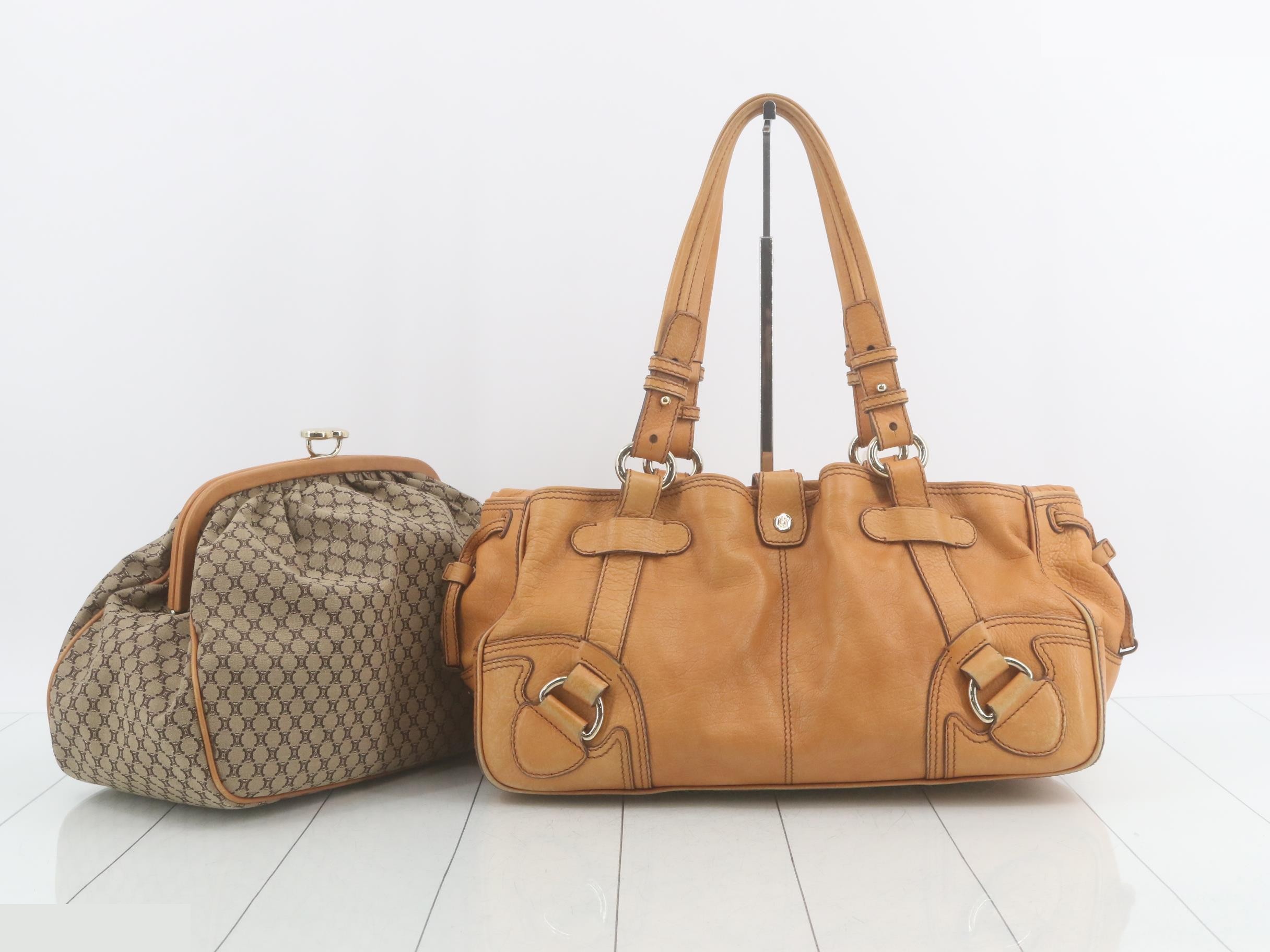 Leather shoulder bag with Macadam pattern, clasp closure, and inner bag included.