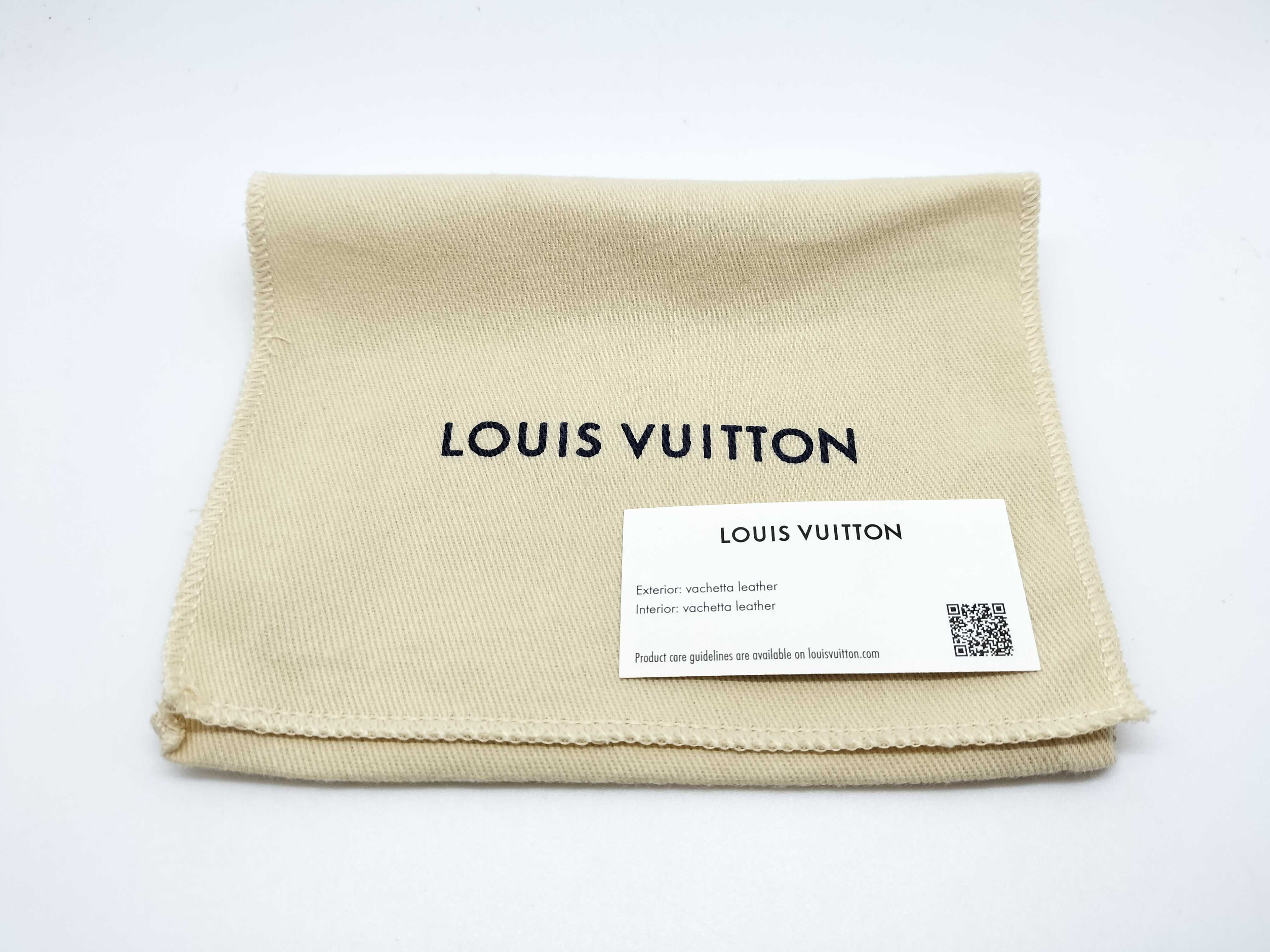 Taurillon LV Vertical Compact Wallet M82438 — view 13