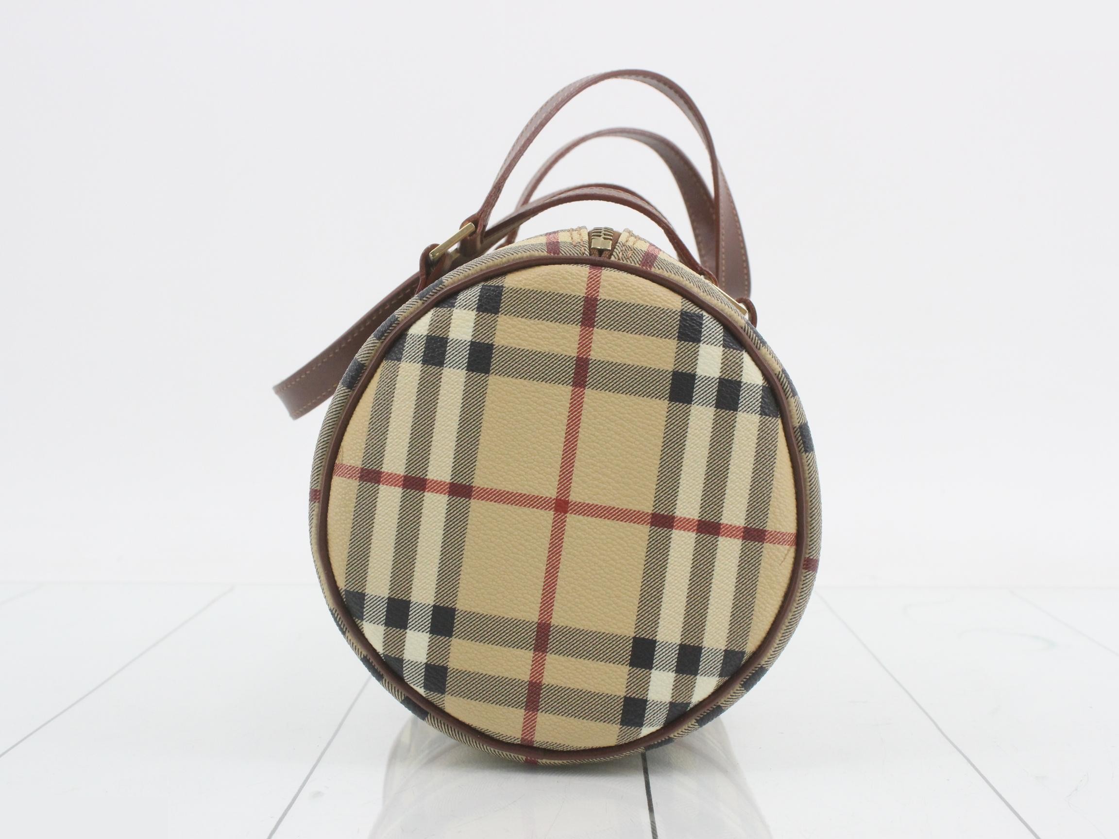 Other lines: Bags & Handbags, Nova Check, PVC — view 3