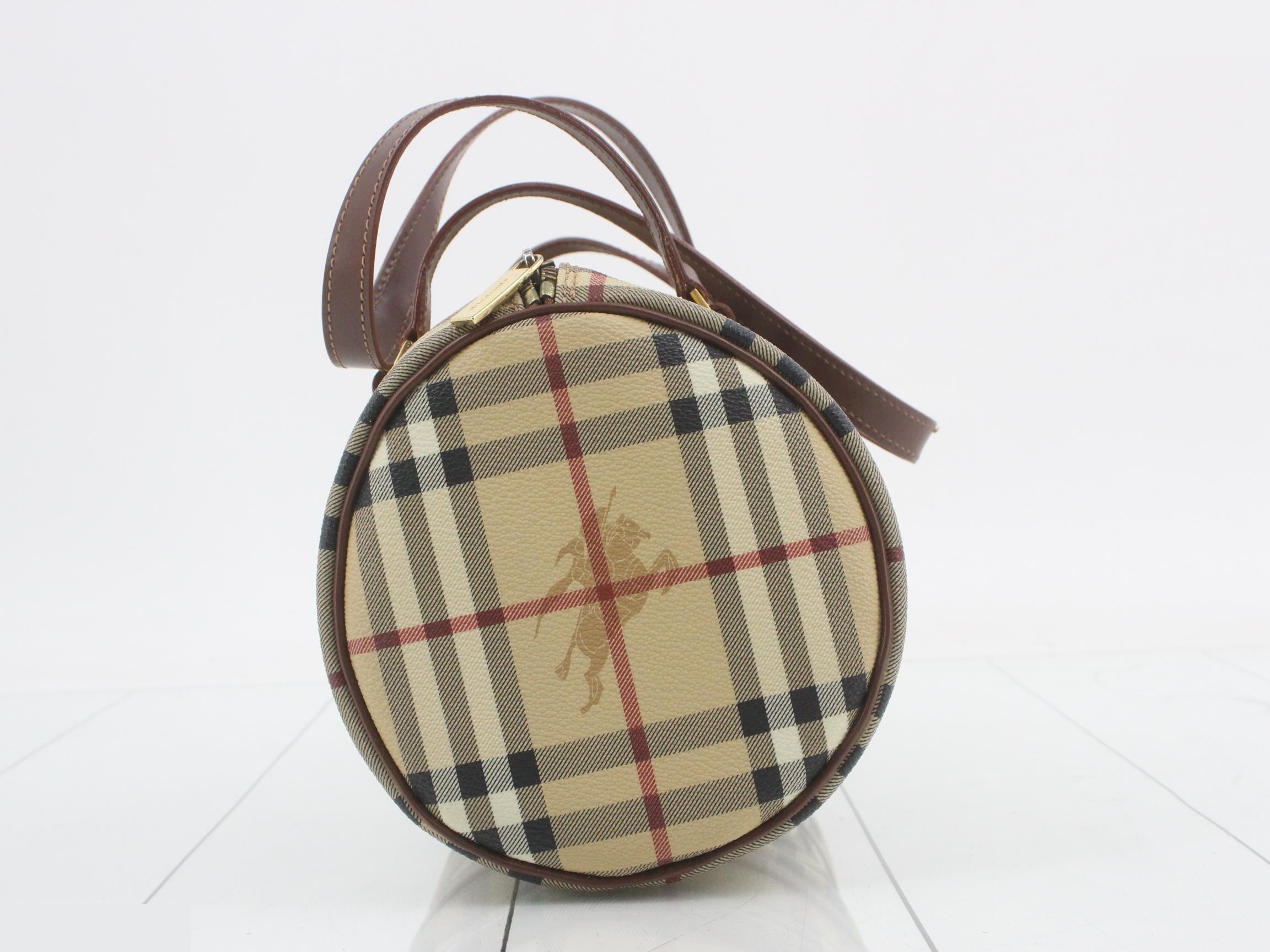 Other lines: Bags & Handbags, Nova Check, PVC — view 4