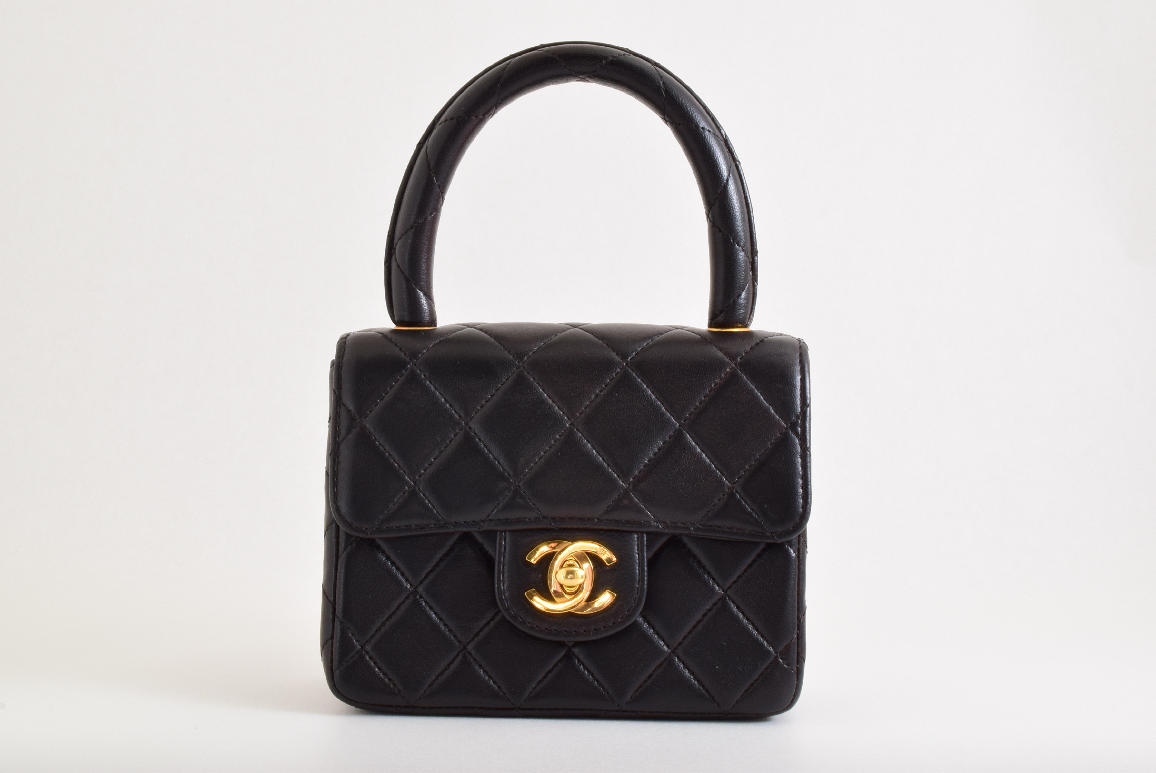 Matelasse Top Handle Black Handbag with Sticker and Card — view 2