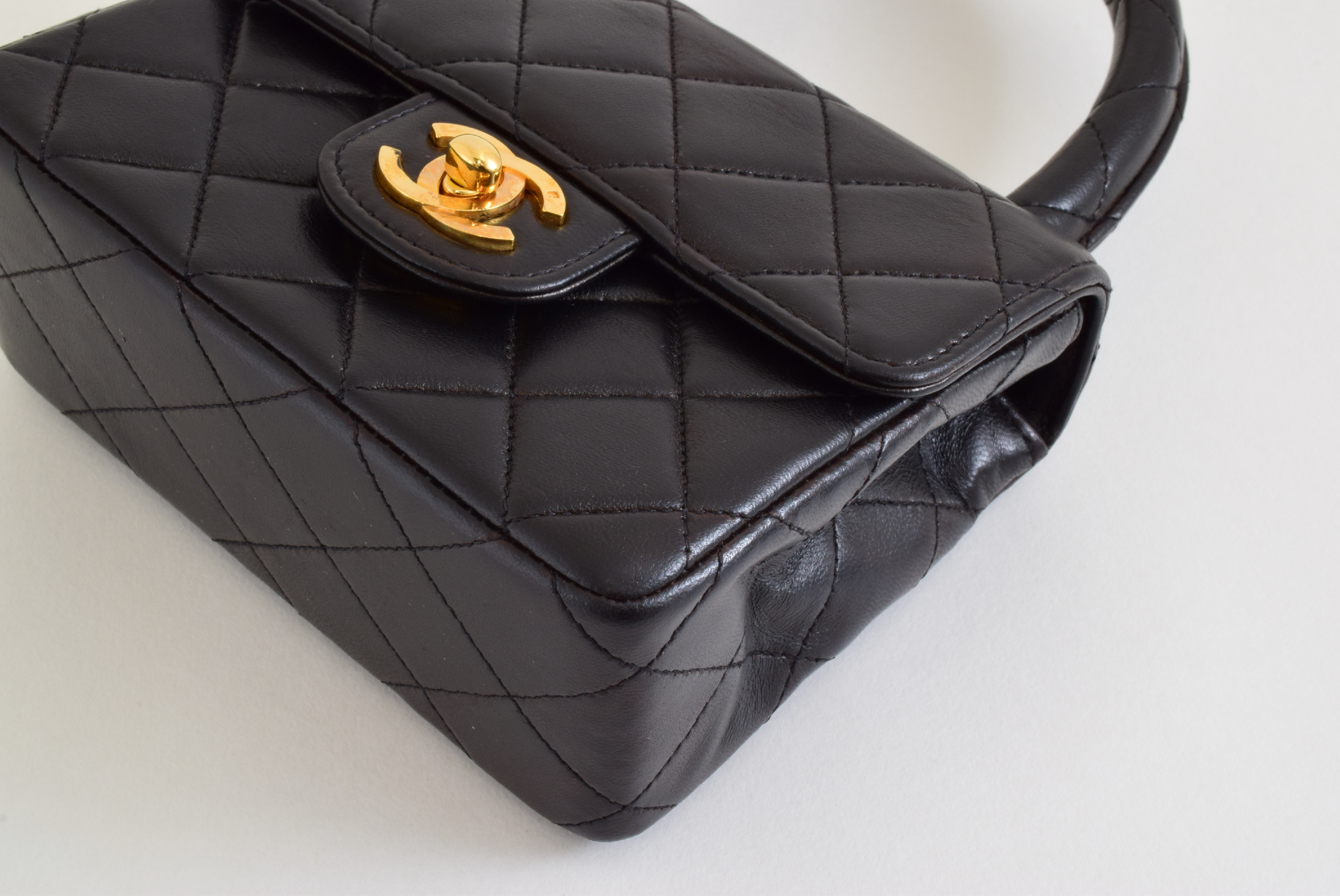 Matelasse Top Handle Black Handbag with Sticker and Card — view 4
