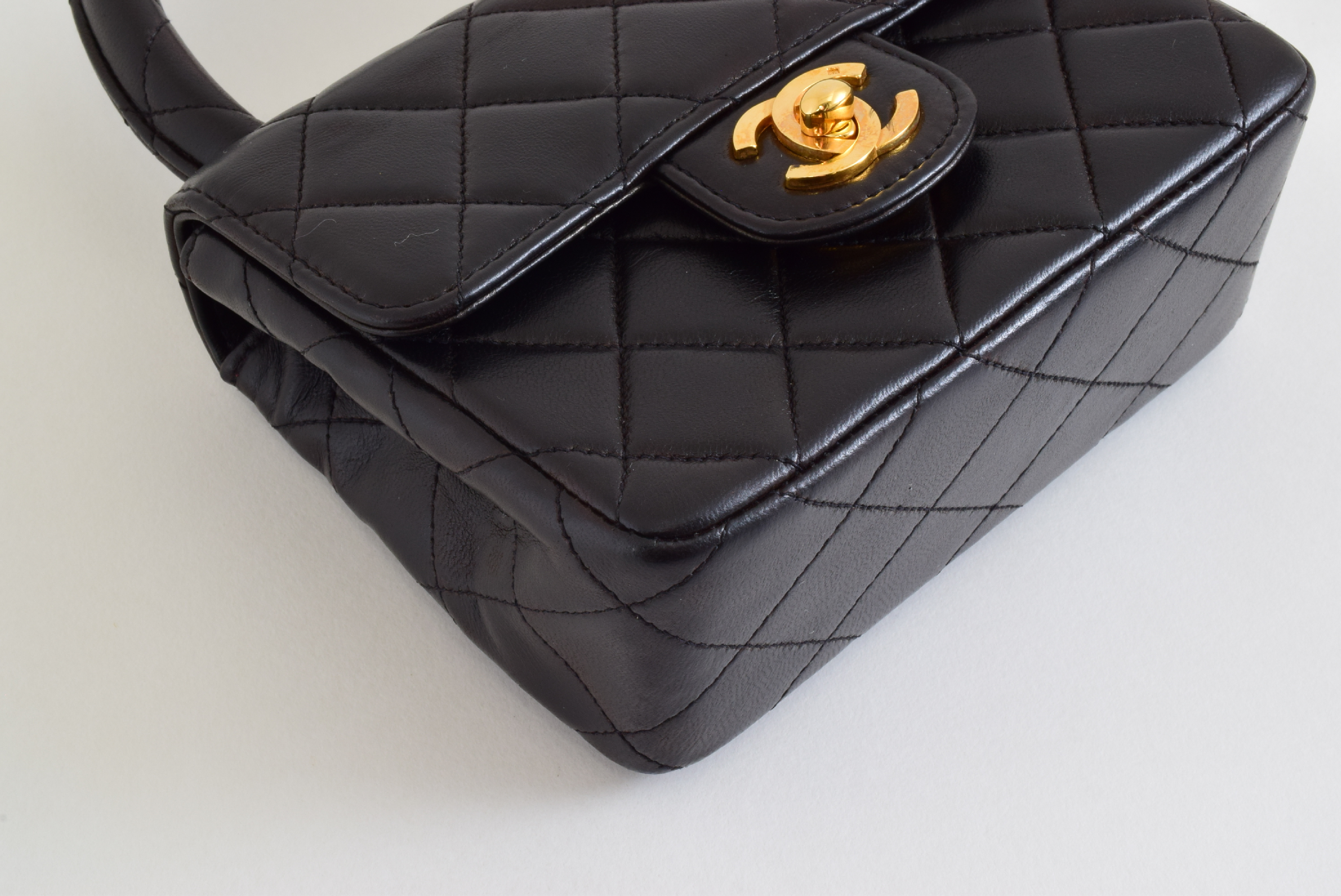Matelasse Top Handle Black Handbag with Sticker and Card — view 5