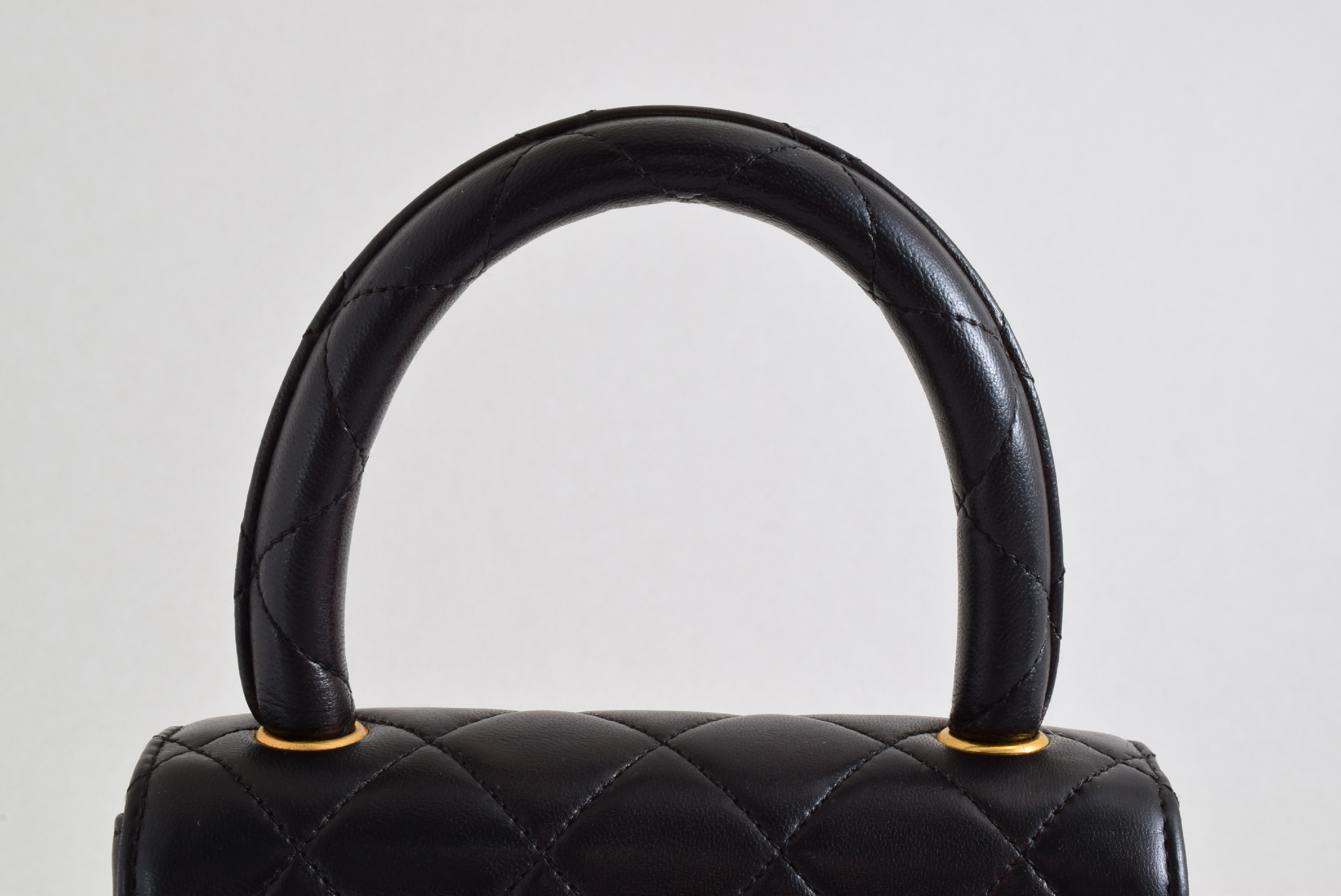 Matelasse Top Handle Black Handbag with Sticker and Card — view 6
