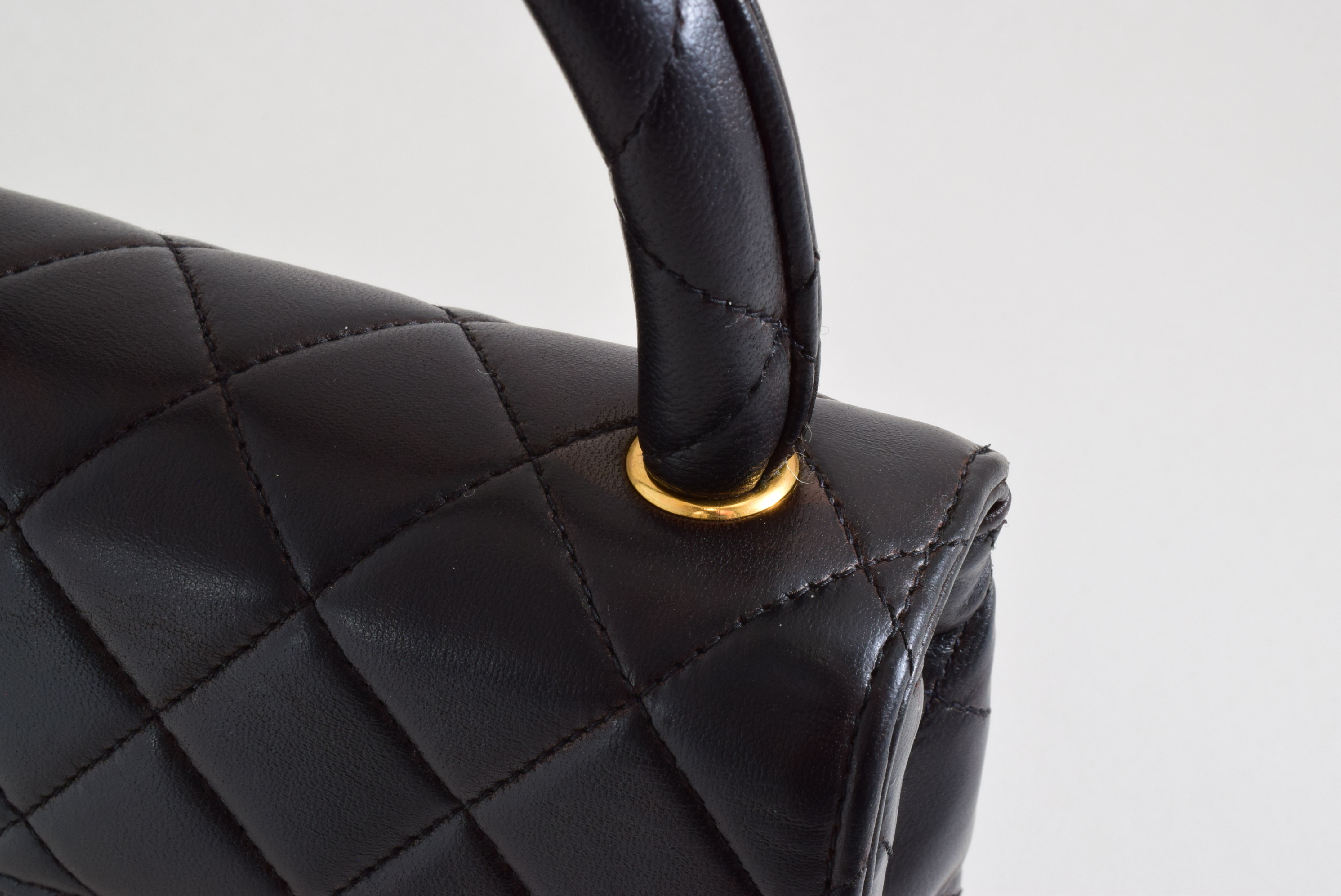 Matelasse Top Handle Black Handbag with Sticker and Card — view 7