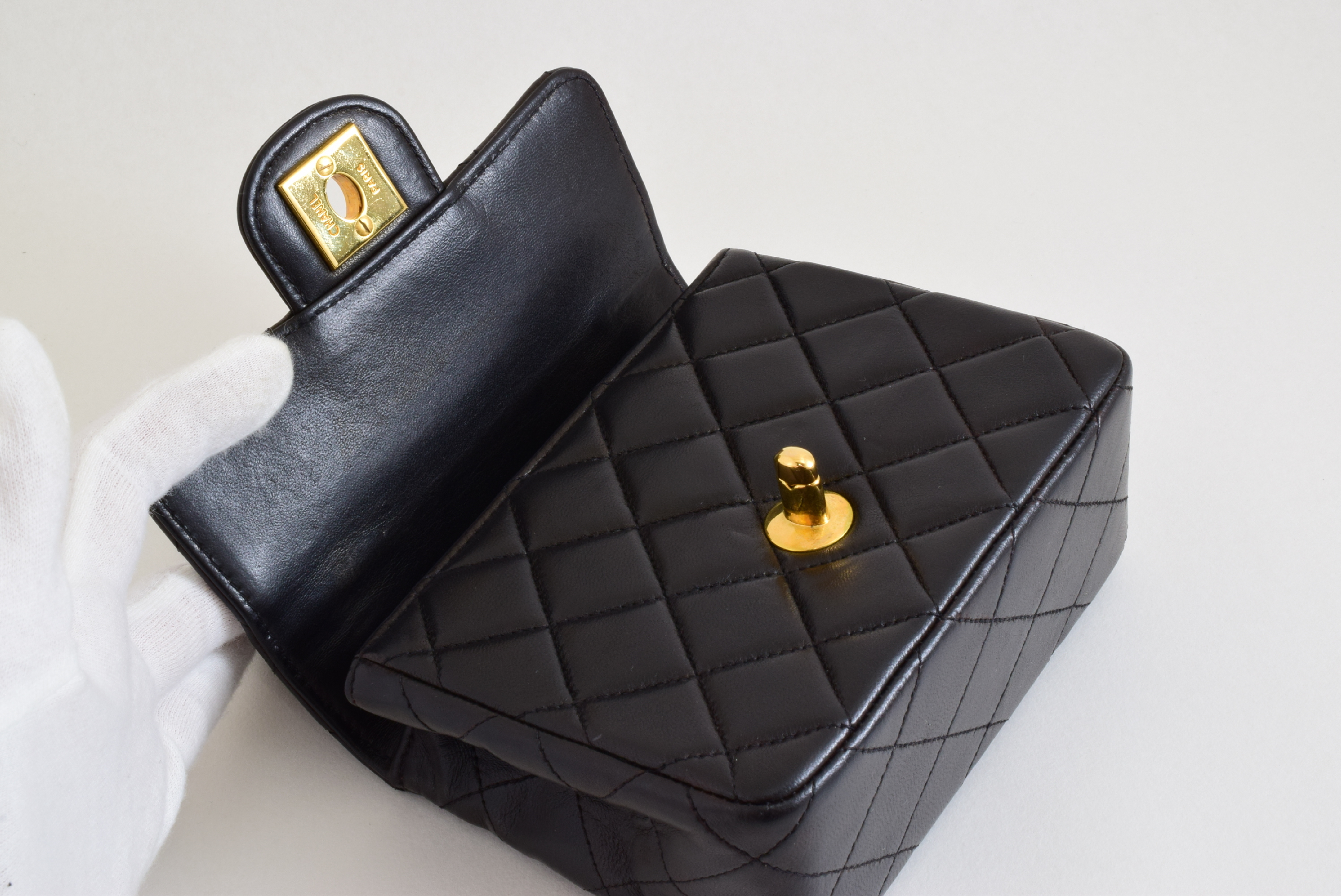 Matelasse Top Handle Black Handbag with Sticker and Card — view 8