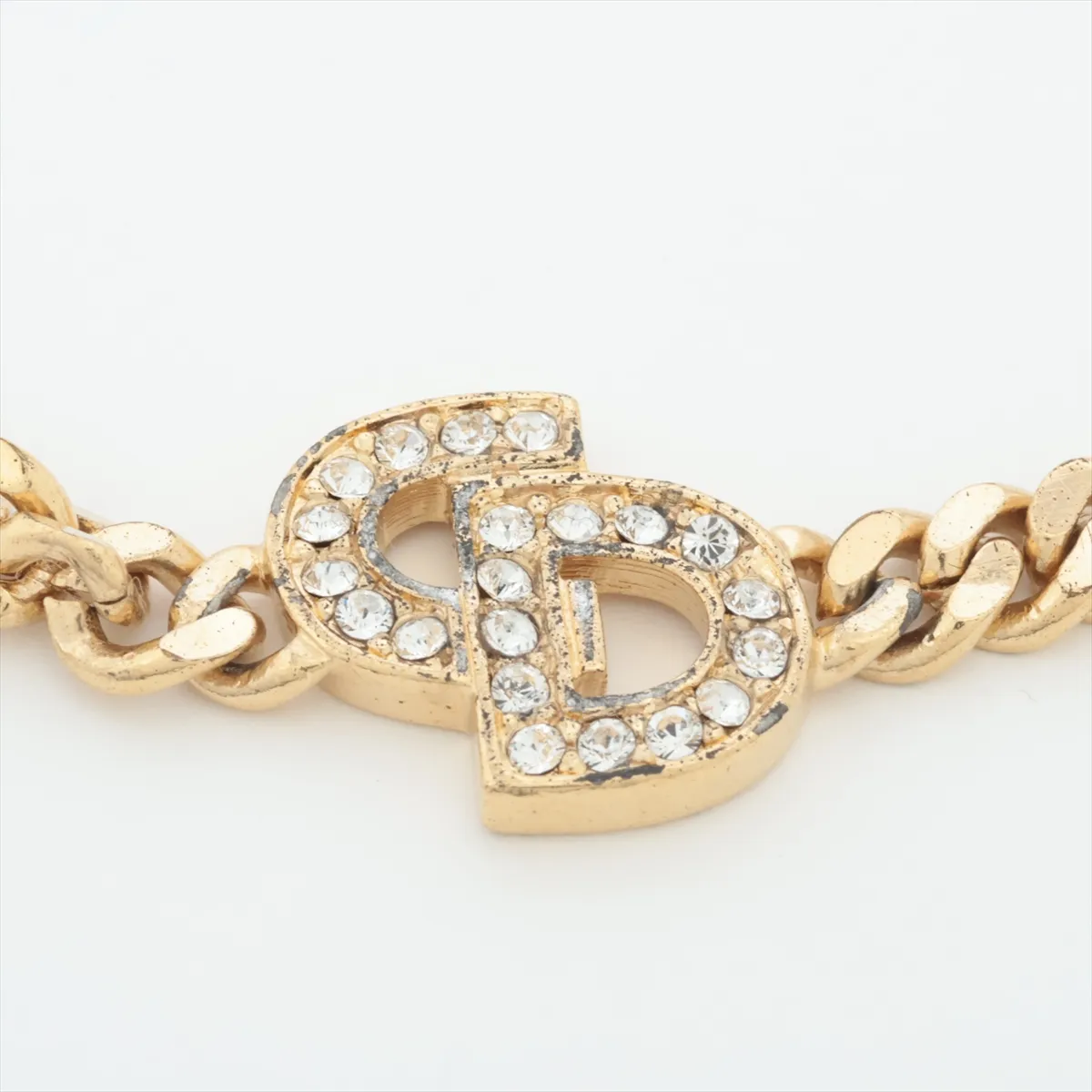 CD logo bracelet, gold plated with rhinestones. Shows signs of wear, — view 2