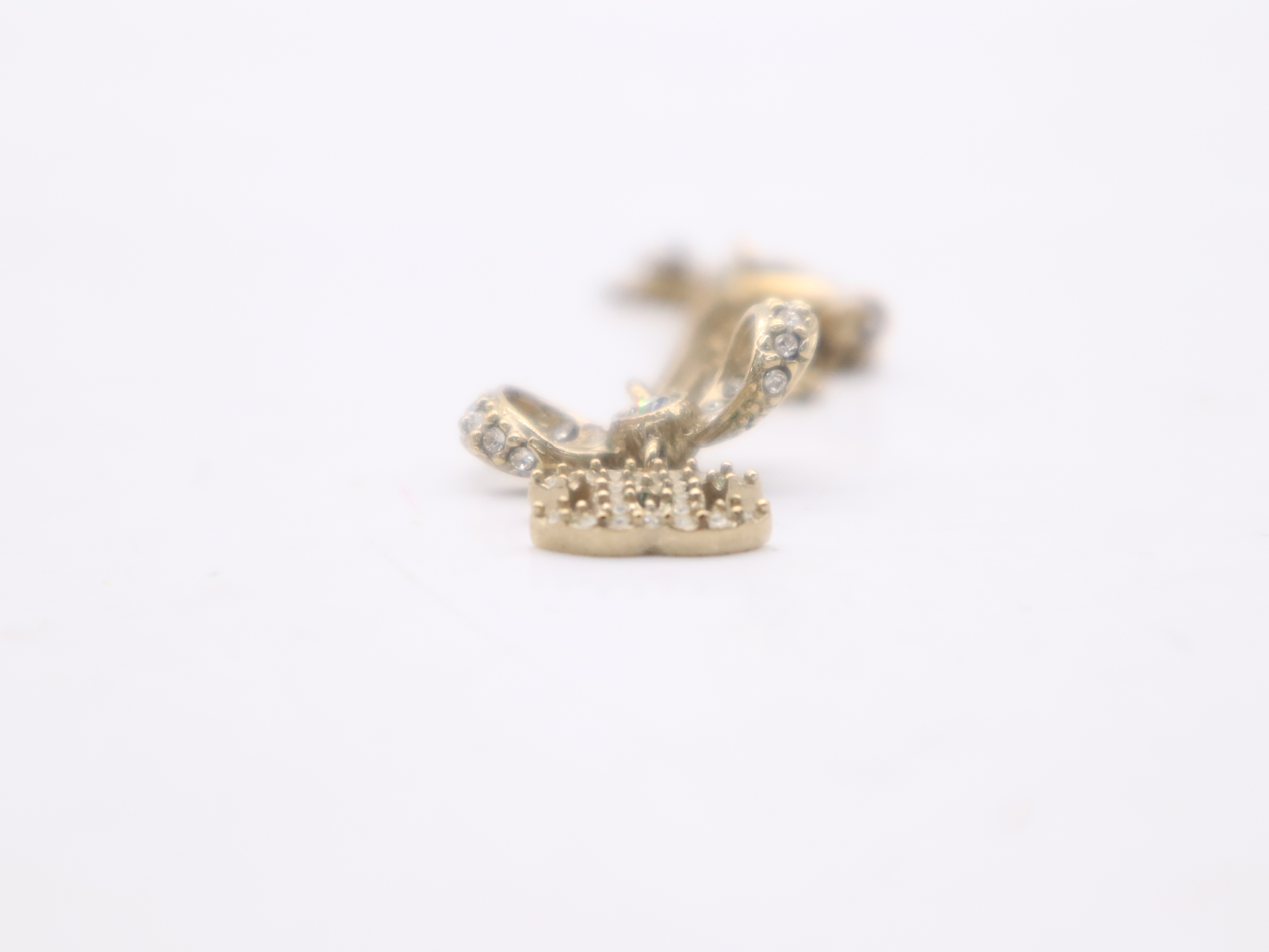 Gold Ribbon Coco Mark Necklace — view 4