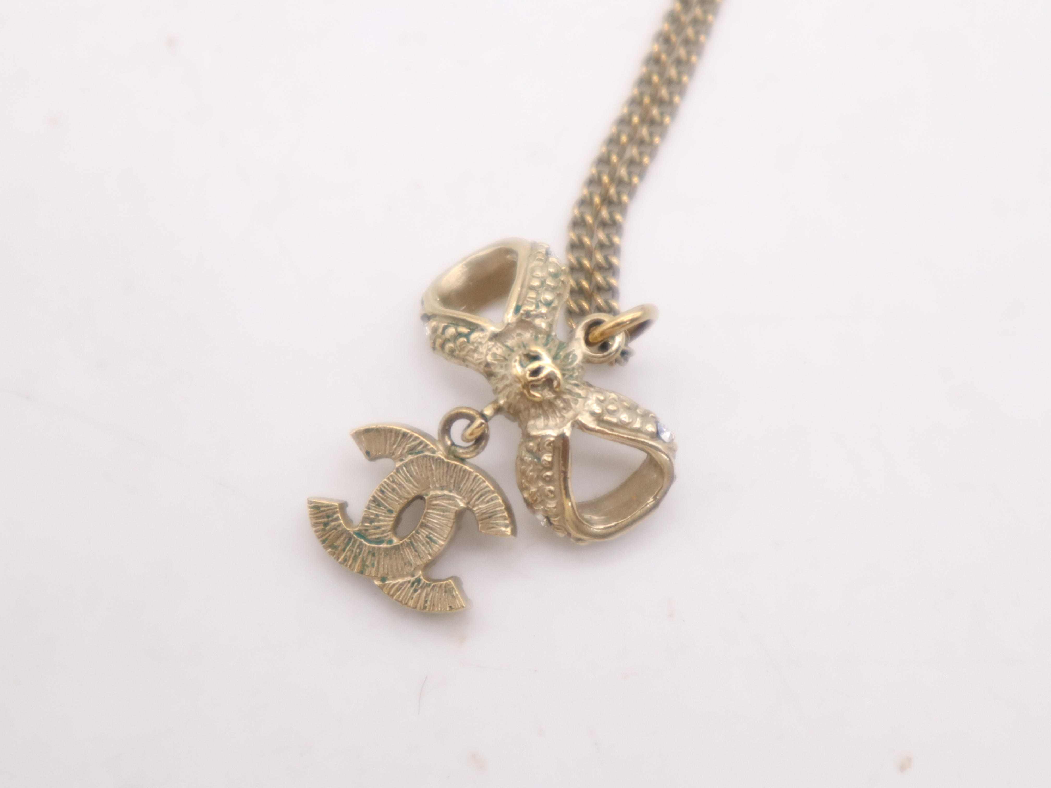 Gold Ribbon Coco Mark Necklace — view 8