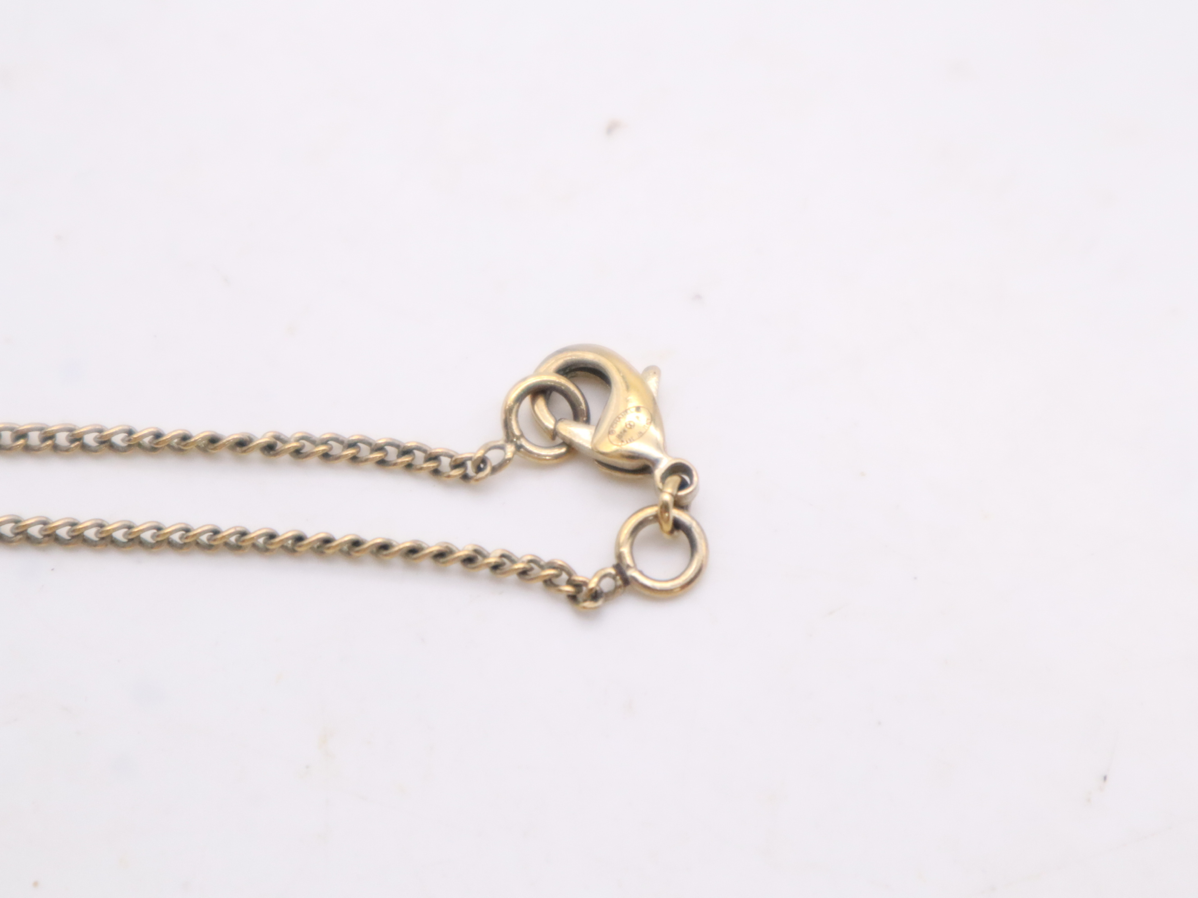 Gold Ribbon Coco Mark Necklace — view 9