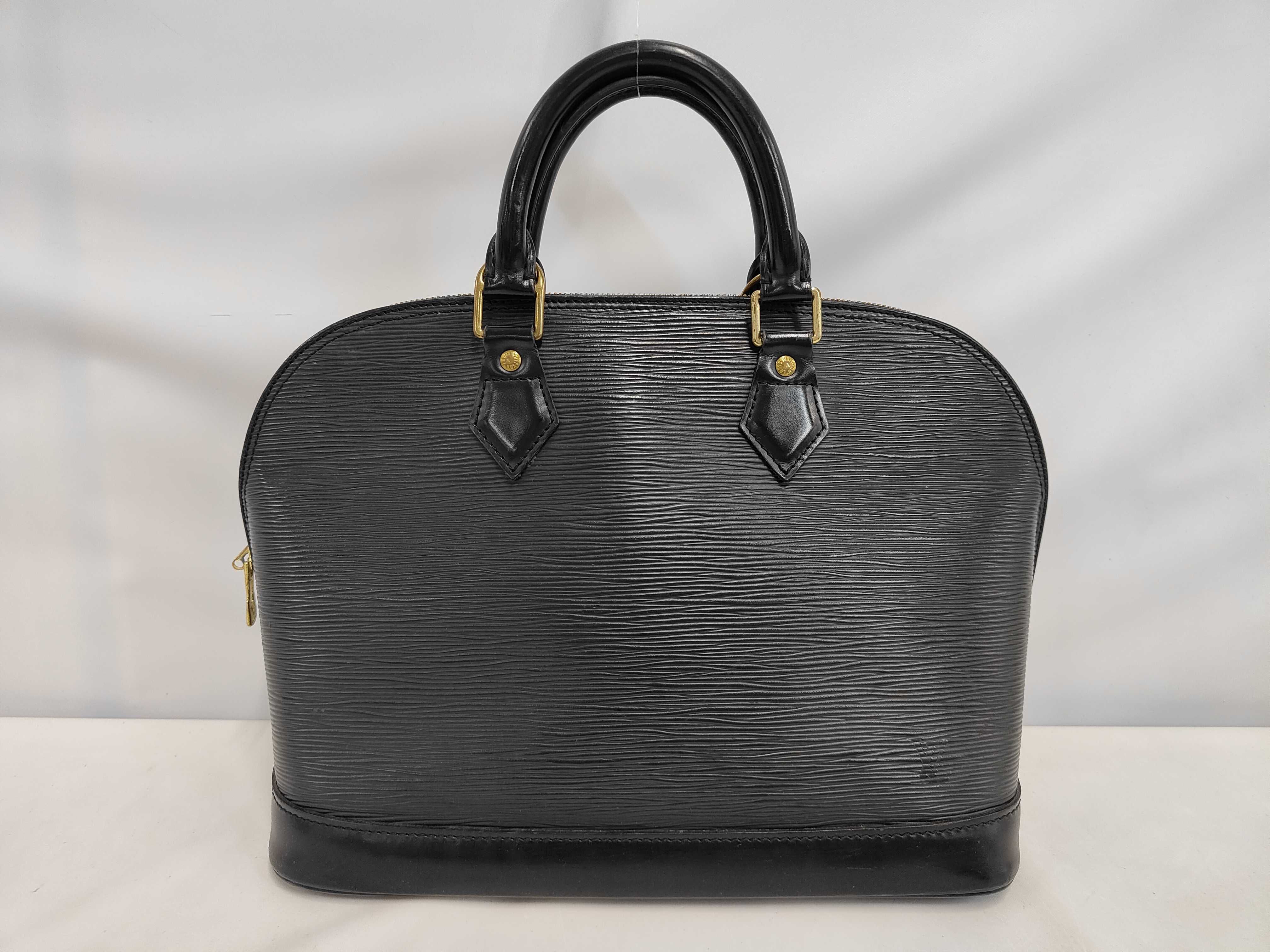 Epi Alma Black Handbag