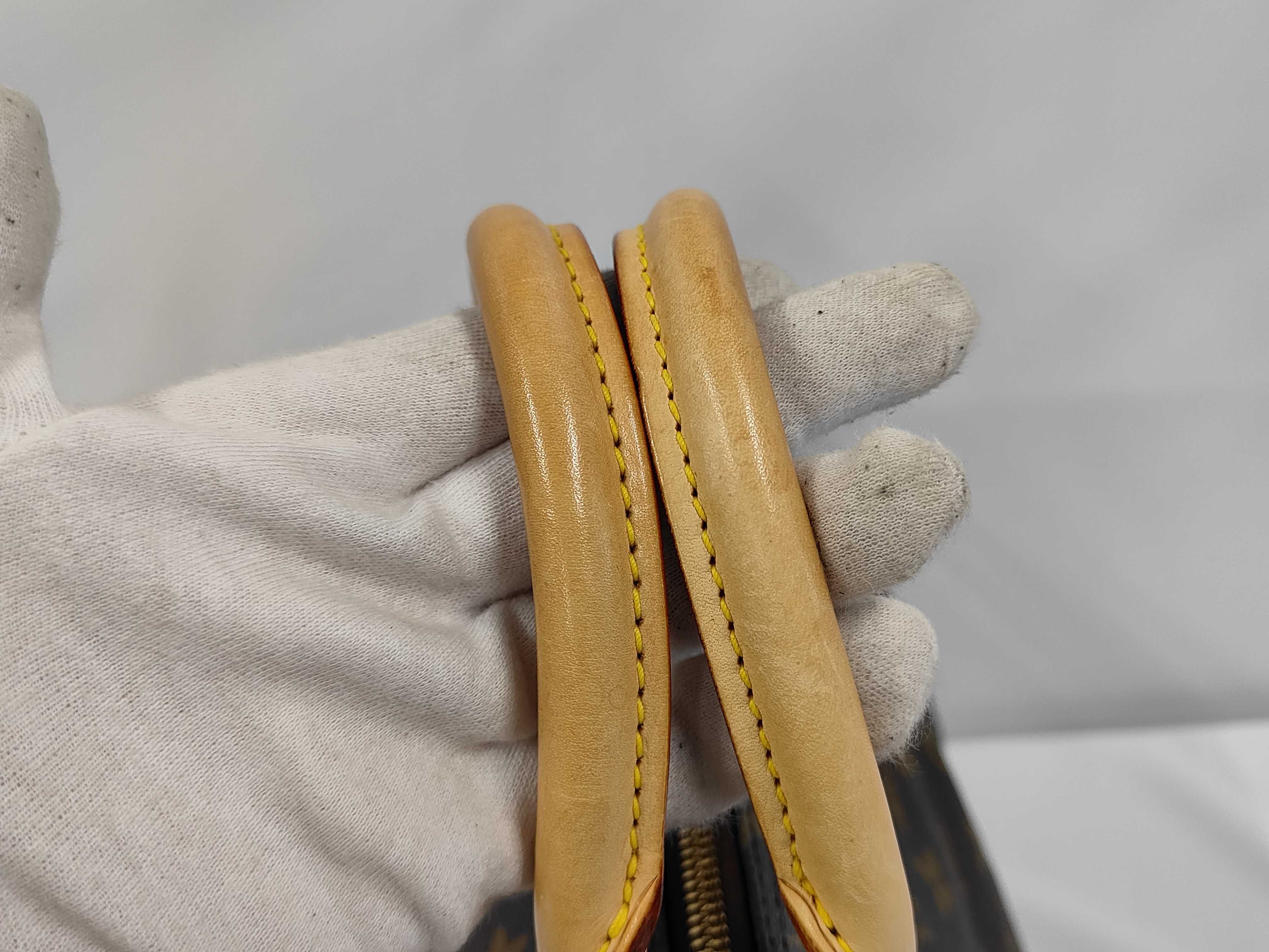 A. Louis Vuitton Speedy Handbag — view 6