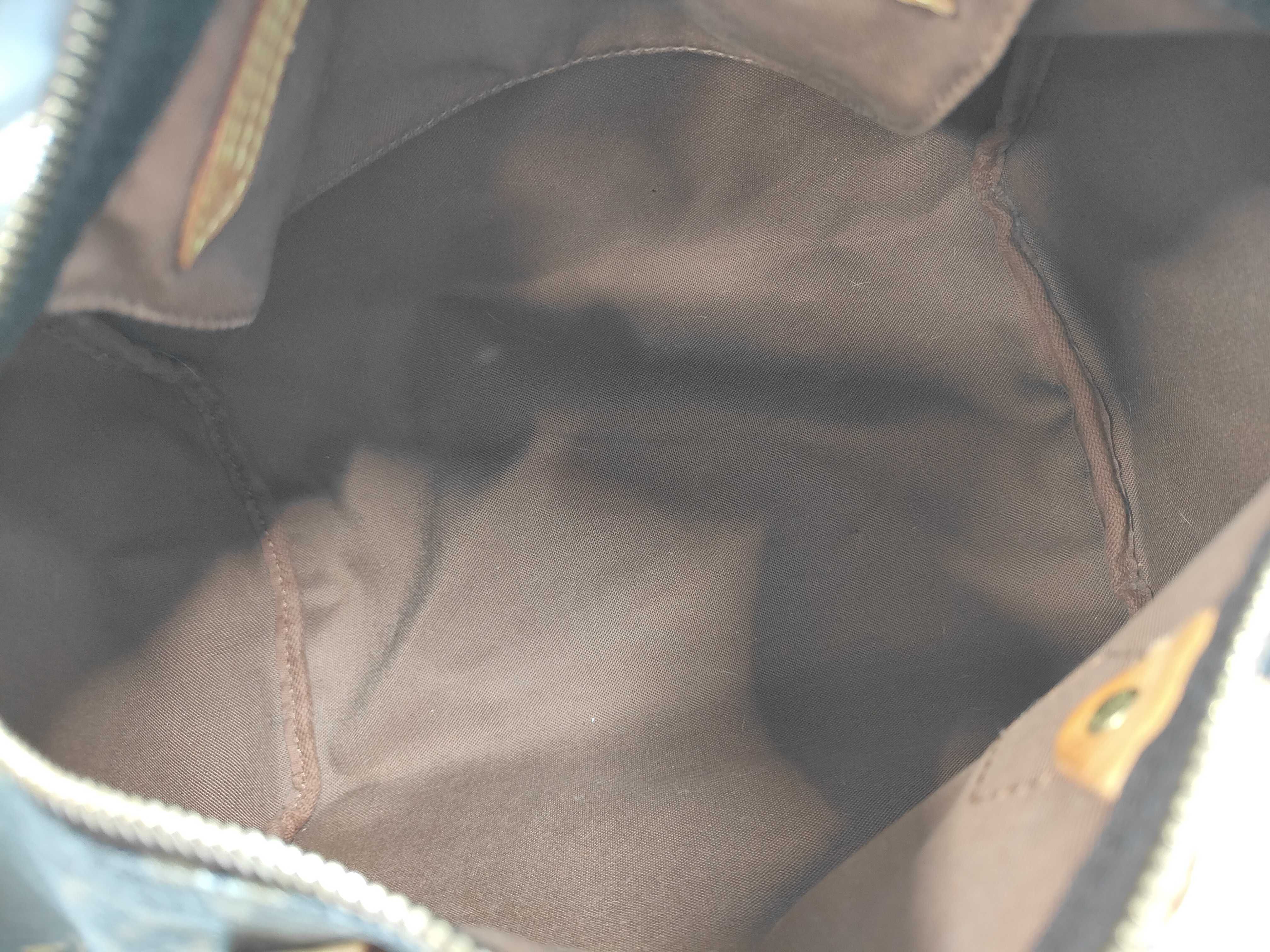 A. Louis Vuitton Speedy Handbag — view 10